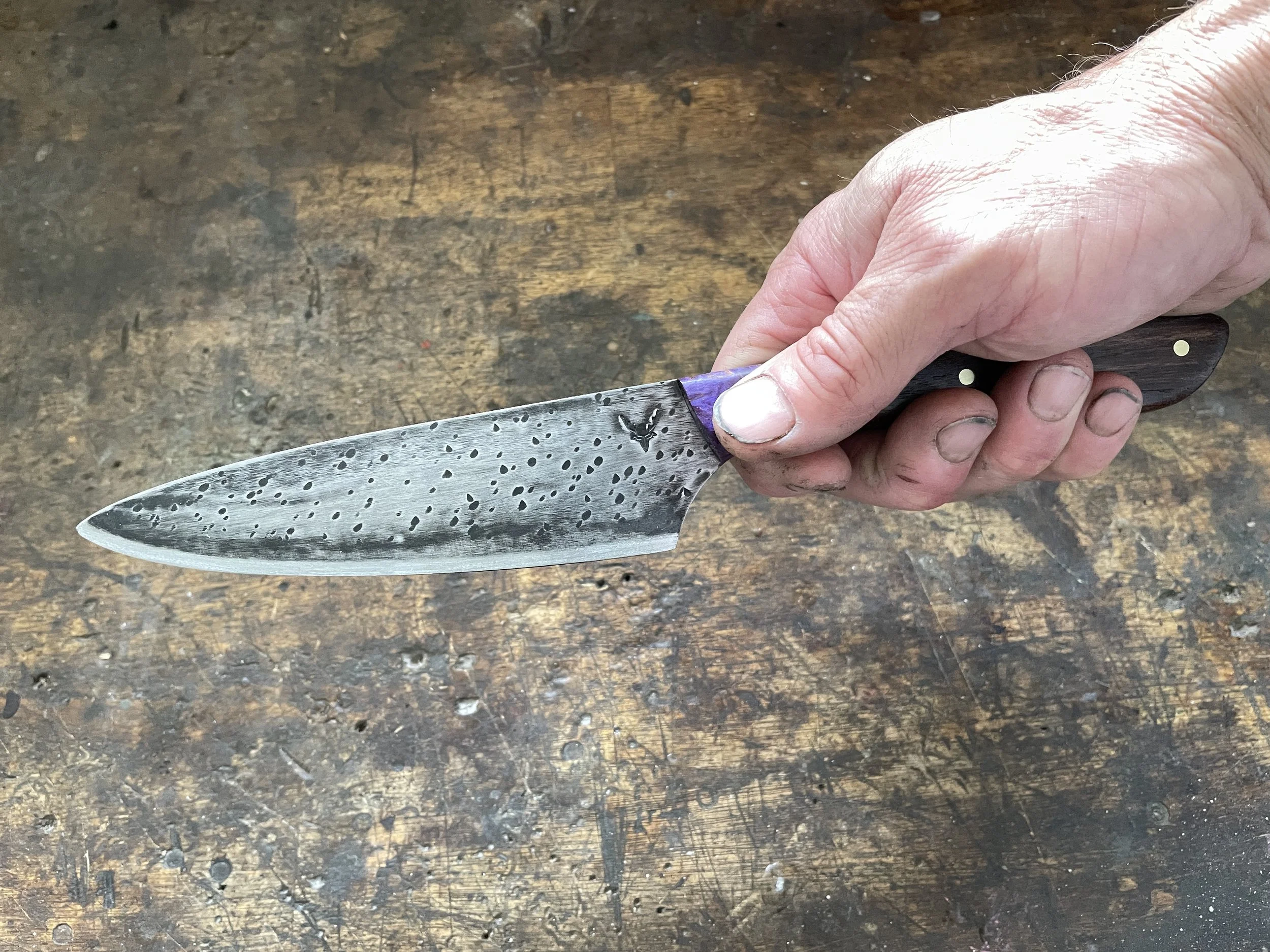 6 inch chef knife with rata & amboyna burl in the hand