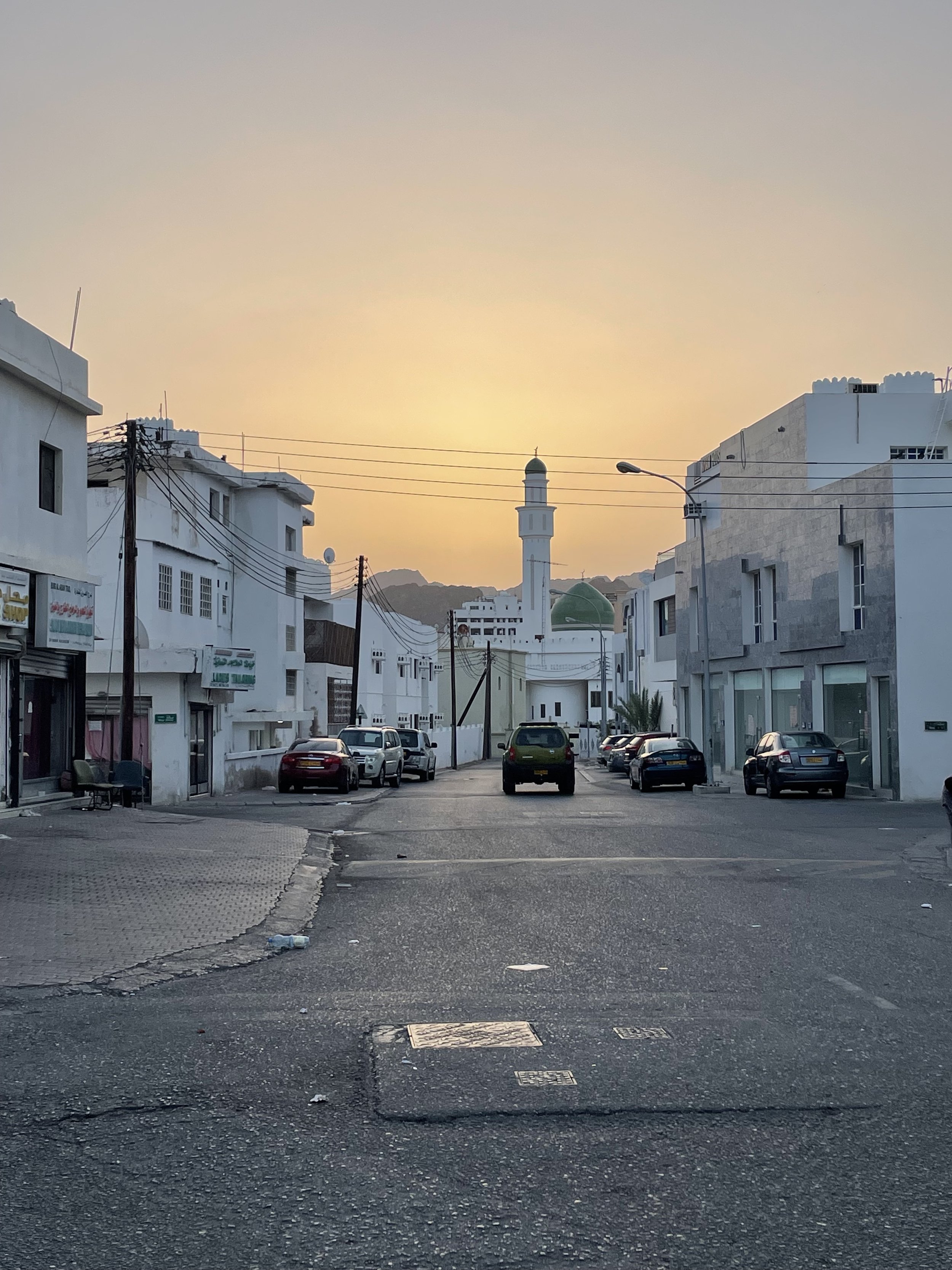 Muscat sunset over city.jpg