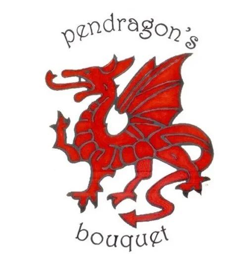 A red dragon is framed on the top and bottom of the image by the words "pendragon" and "bouquet."