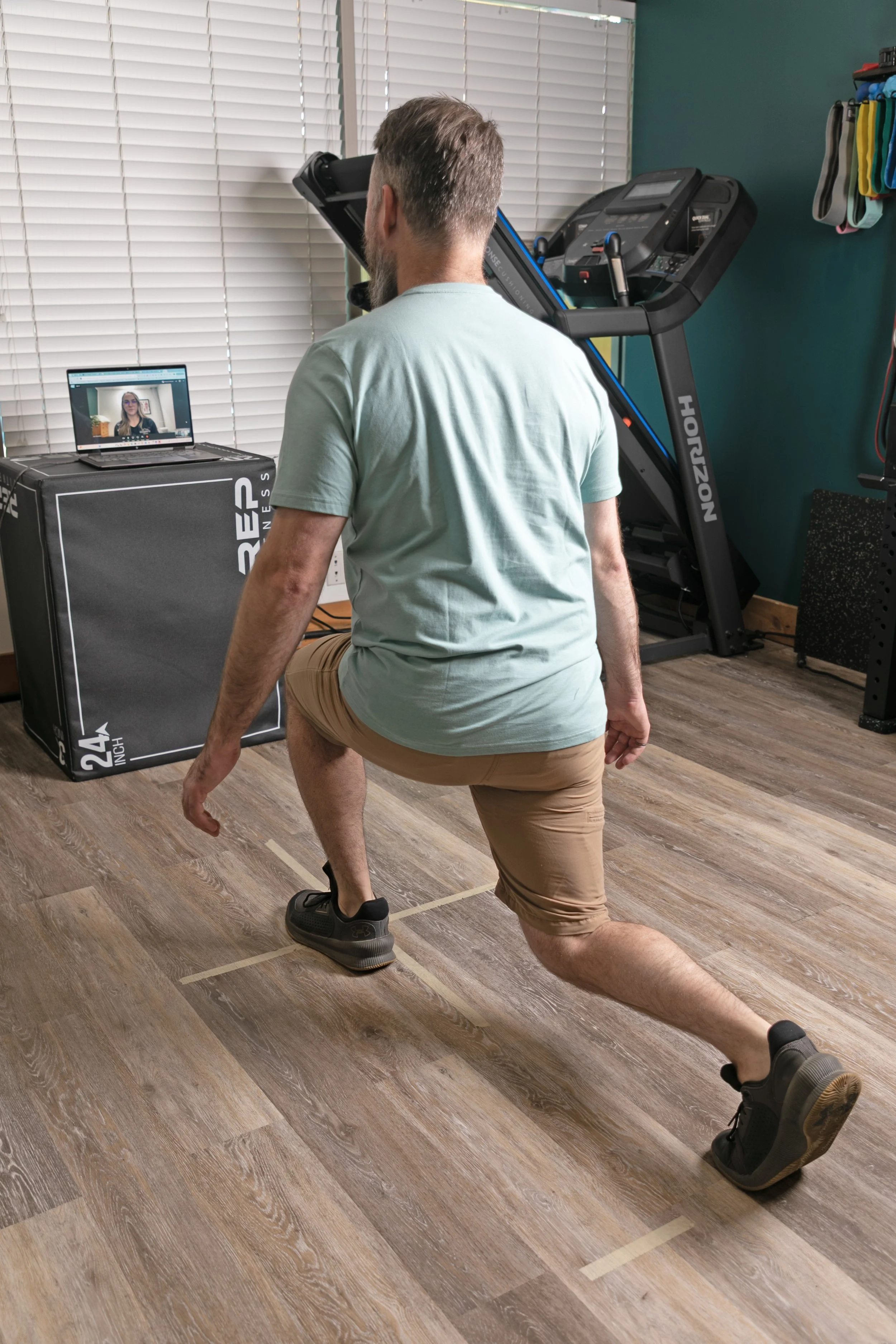 A physiotherapist at Ridgeline Physio in Fernie doing telehealth virtual physio