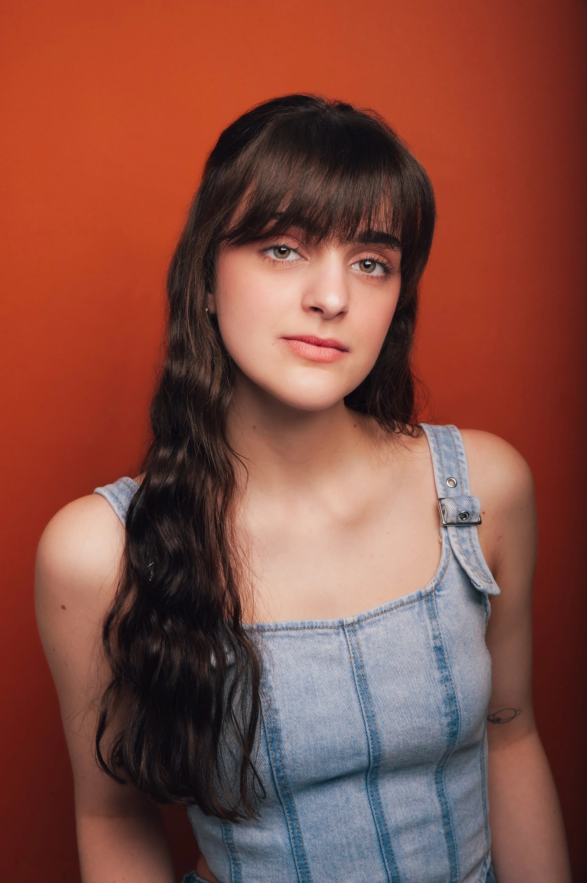 alex portaro headshot orange.JPG