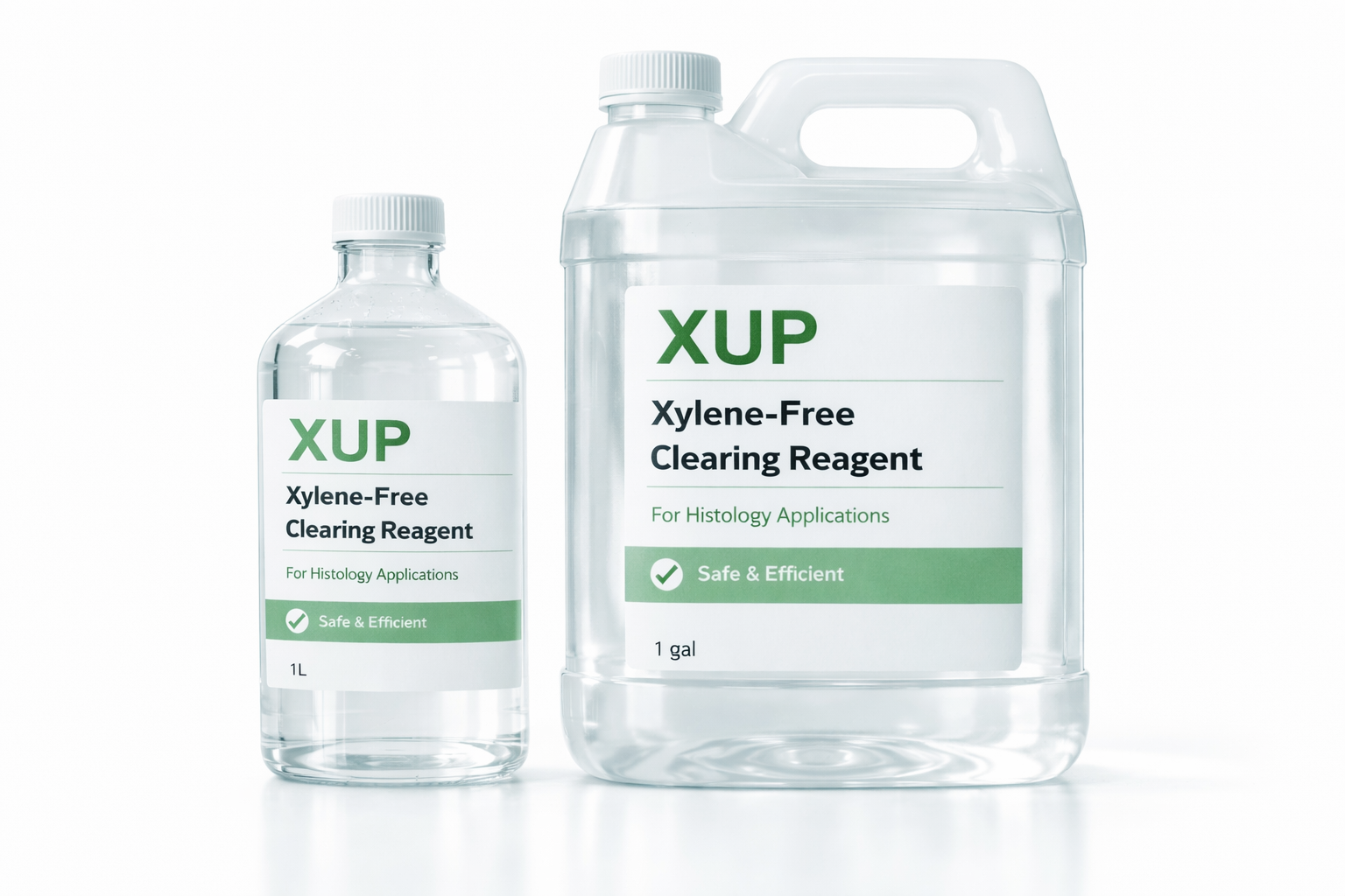 Two bottles of XUP Xylene-Free Clearing Reagent, one small and one large, with white labels and green accents.