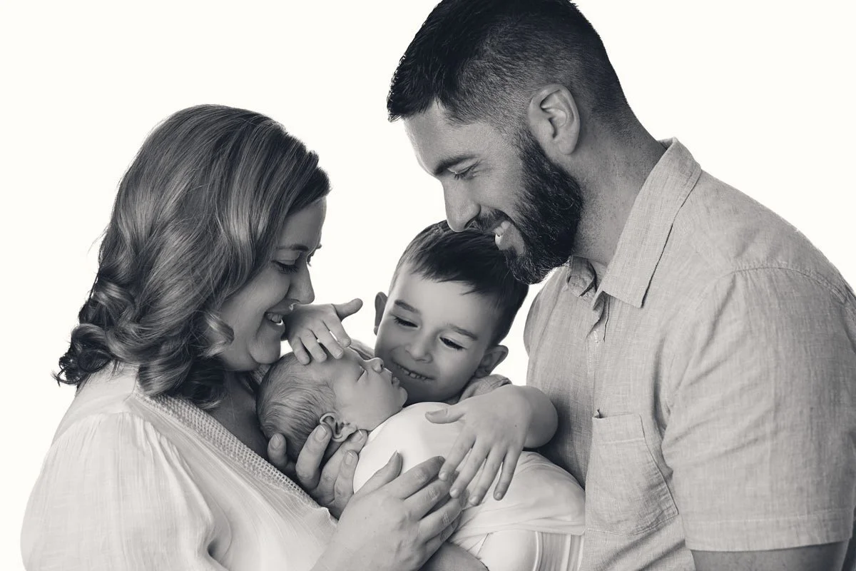 backlit portrait of family of four.jpg
