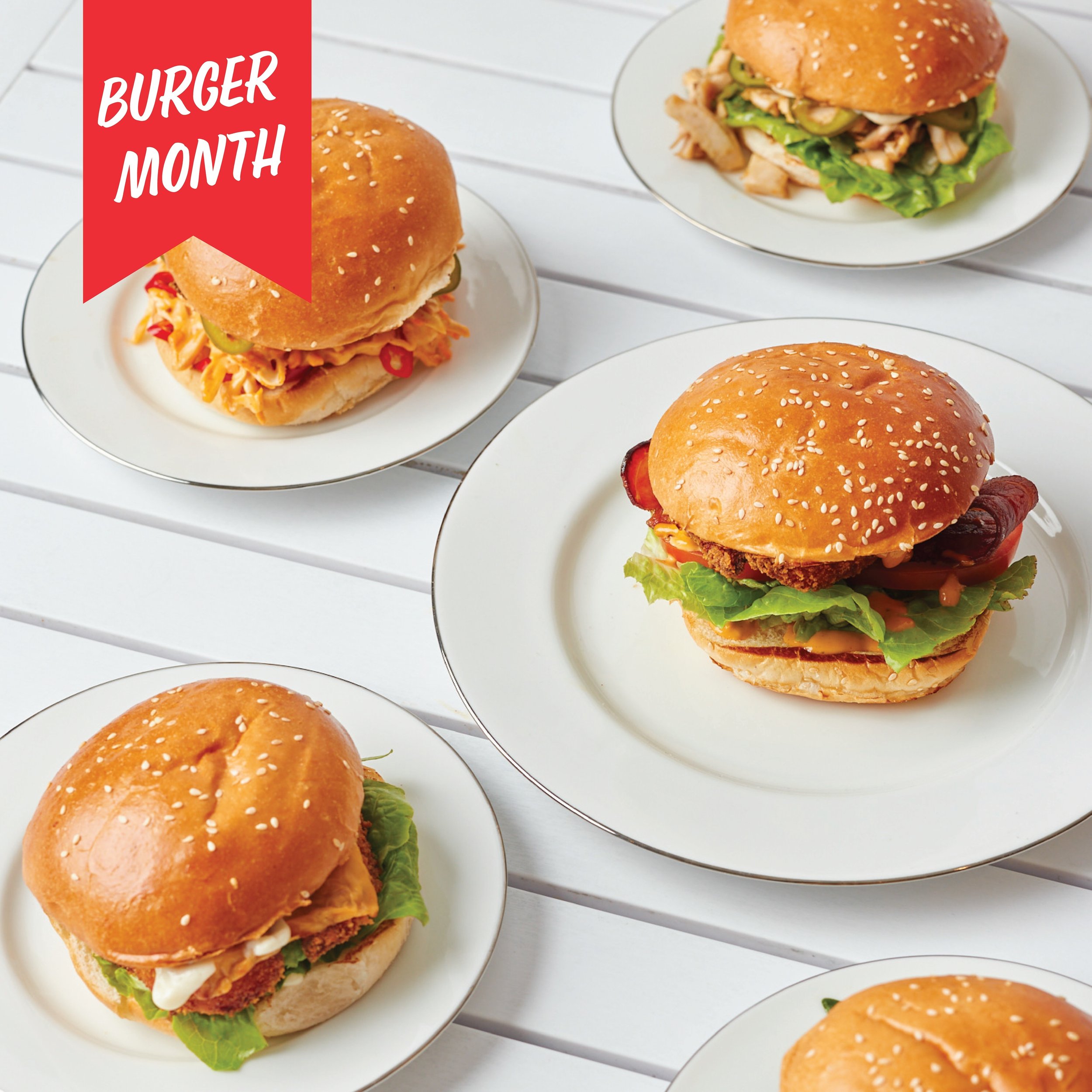 Celebrating International Burger Month with our mouthwatering chicken burgers!

Calling all burger devotees come sink your teeth into our juicy chicken burgers stacked high with all your favorite fixings. 

Whether you're craving classic flavors or s