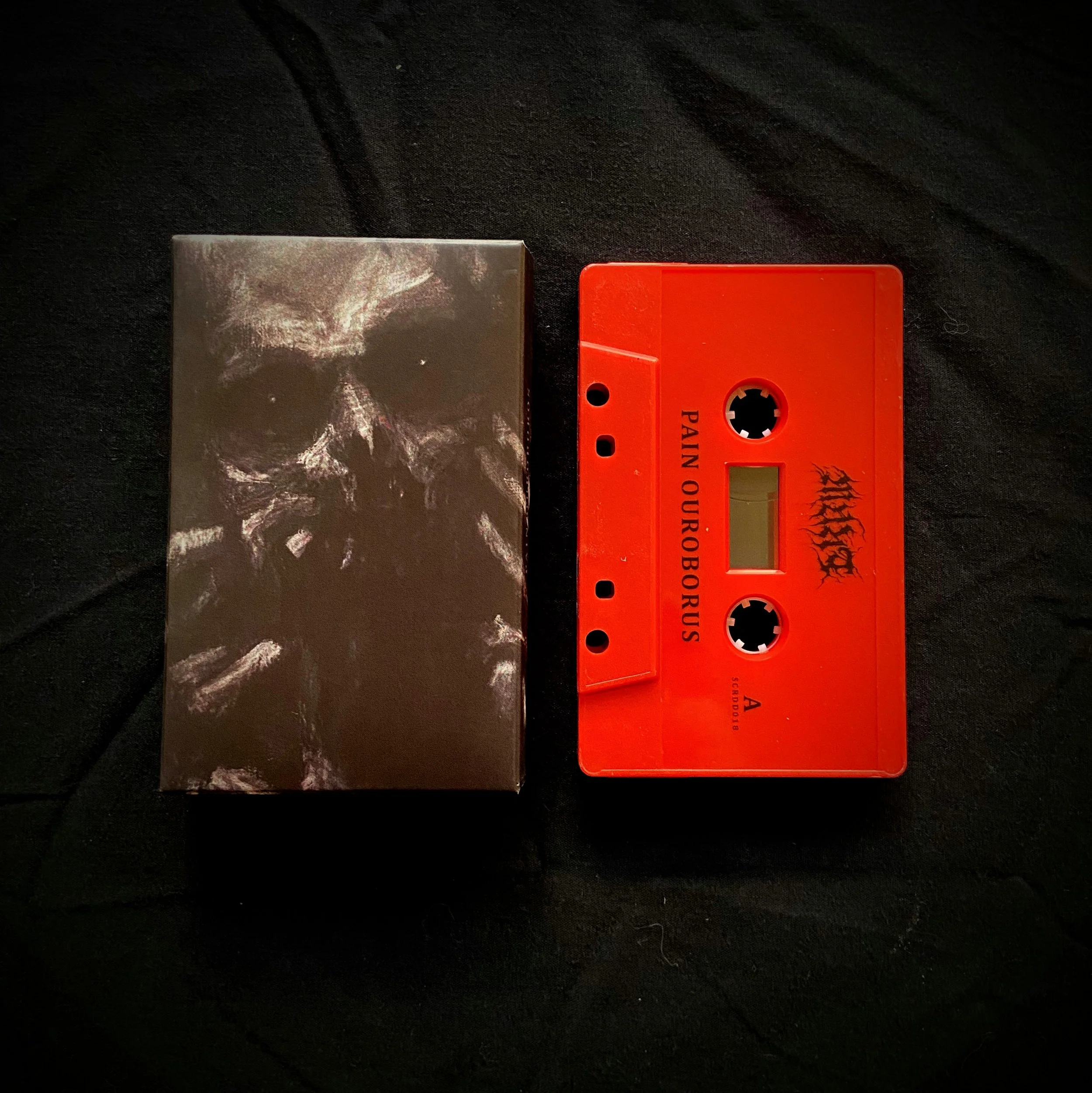 Pain Ouroboros Red Cassette Tape