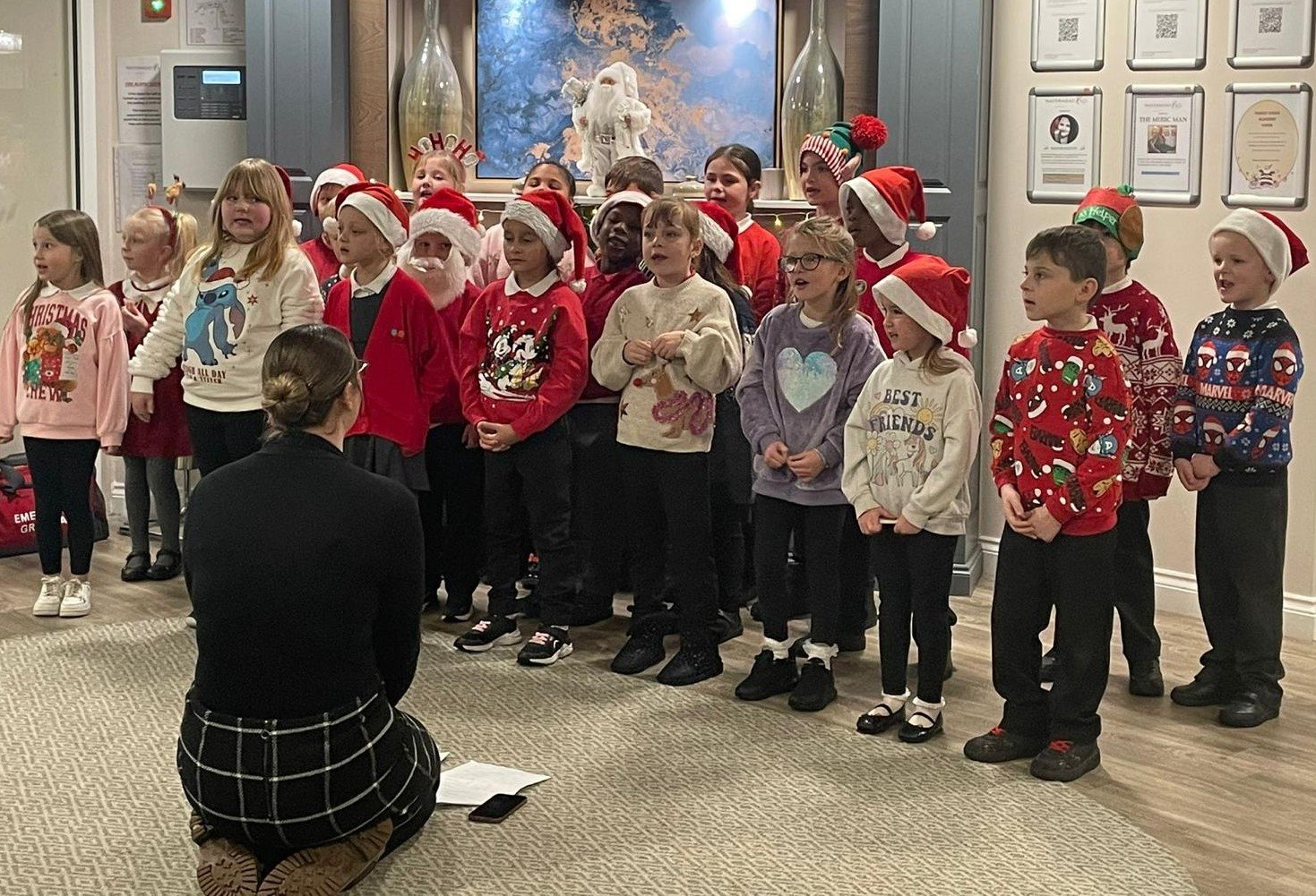 Pupils bring festive cheer to care home residents
