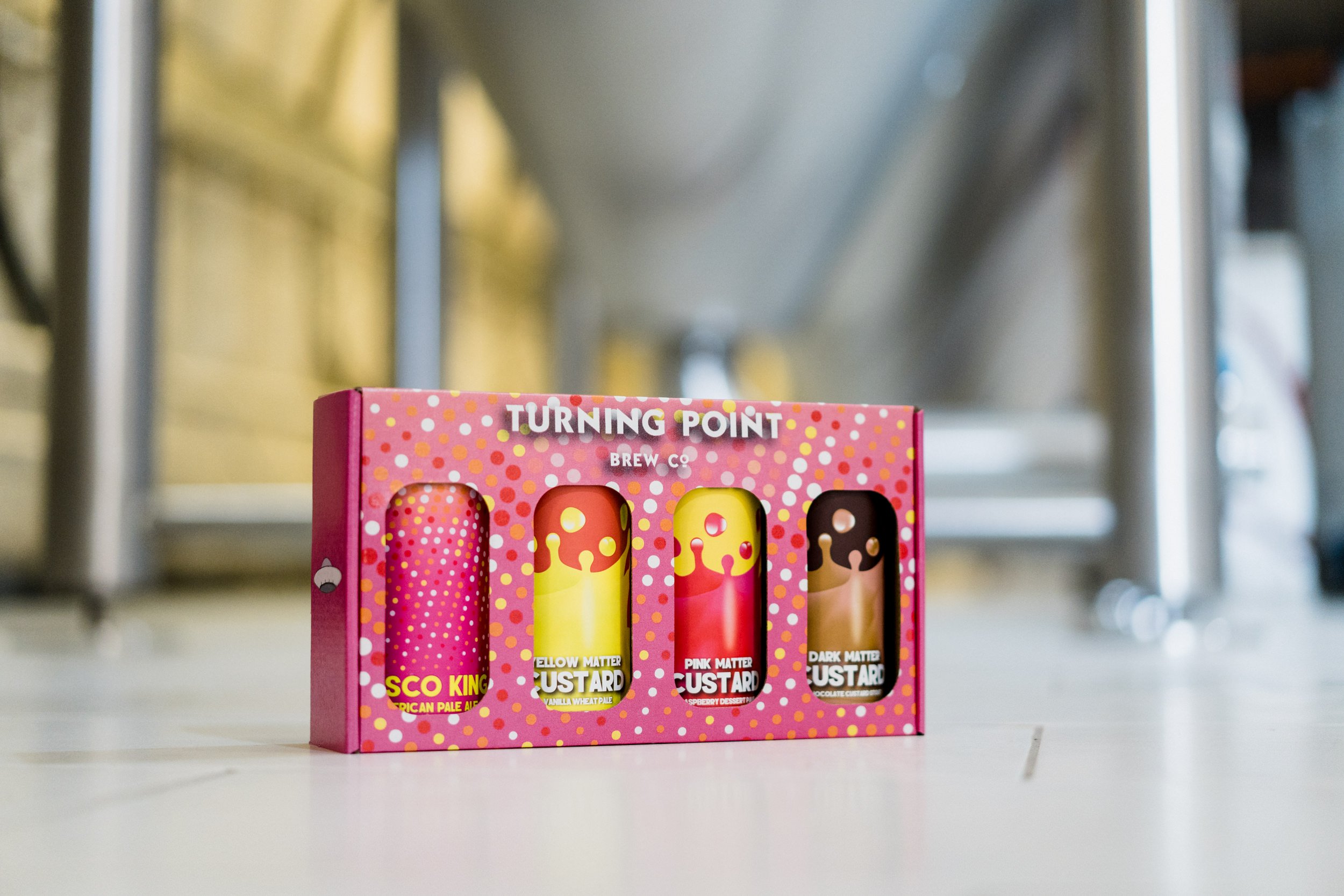 Turning Point brewery cans