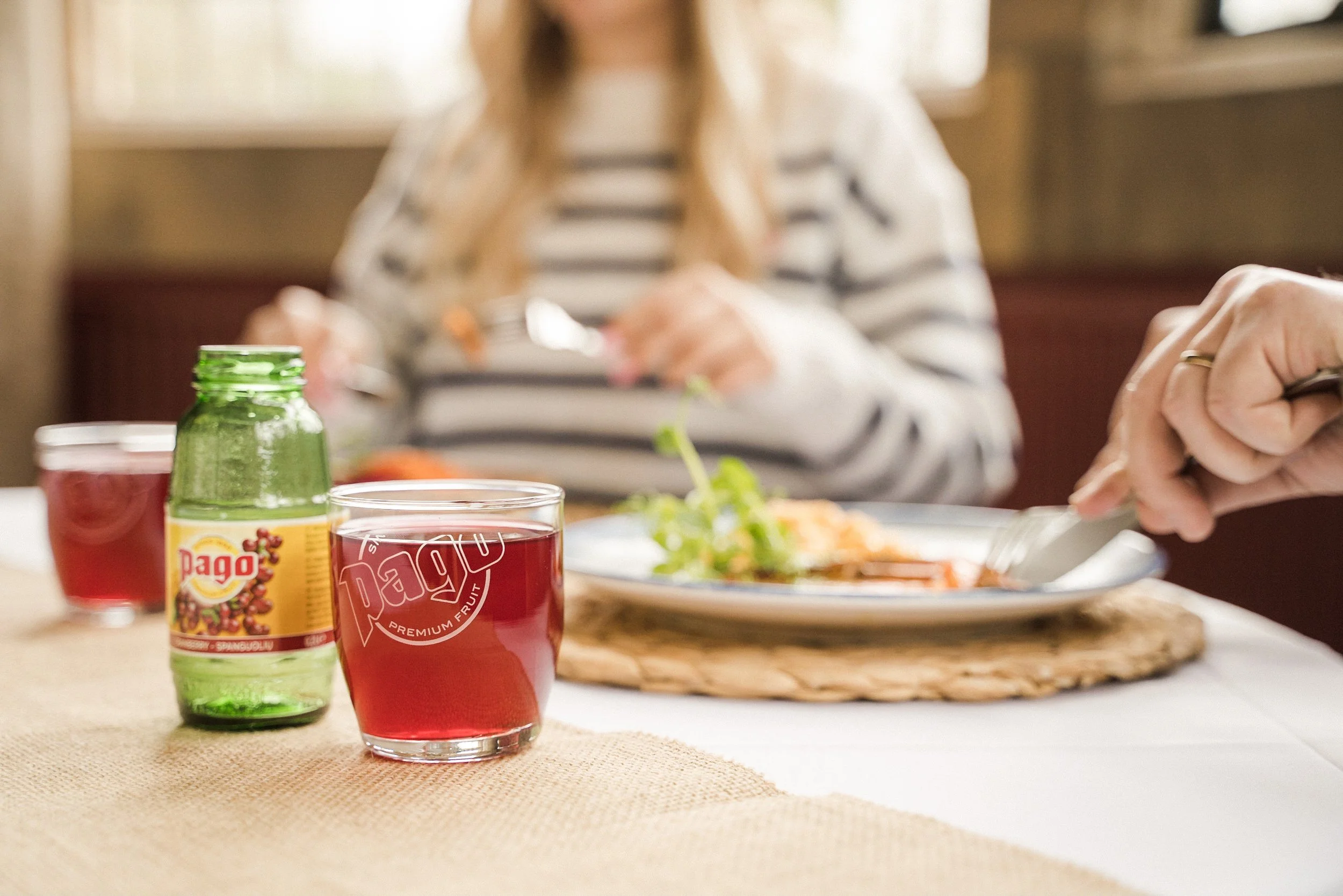 product photography image of pago fruit juice with food