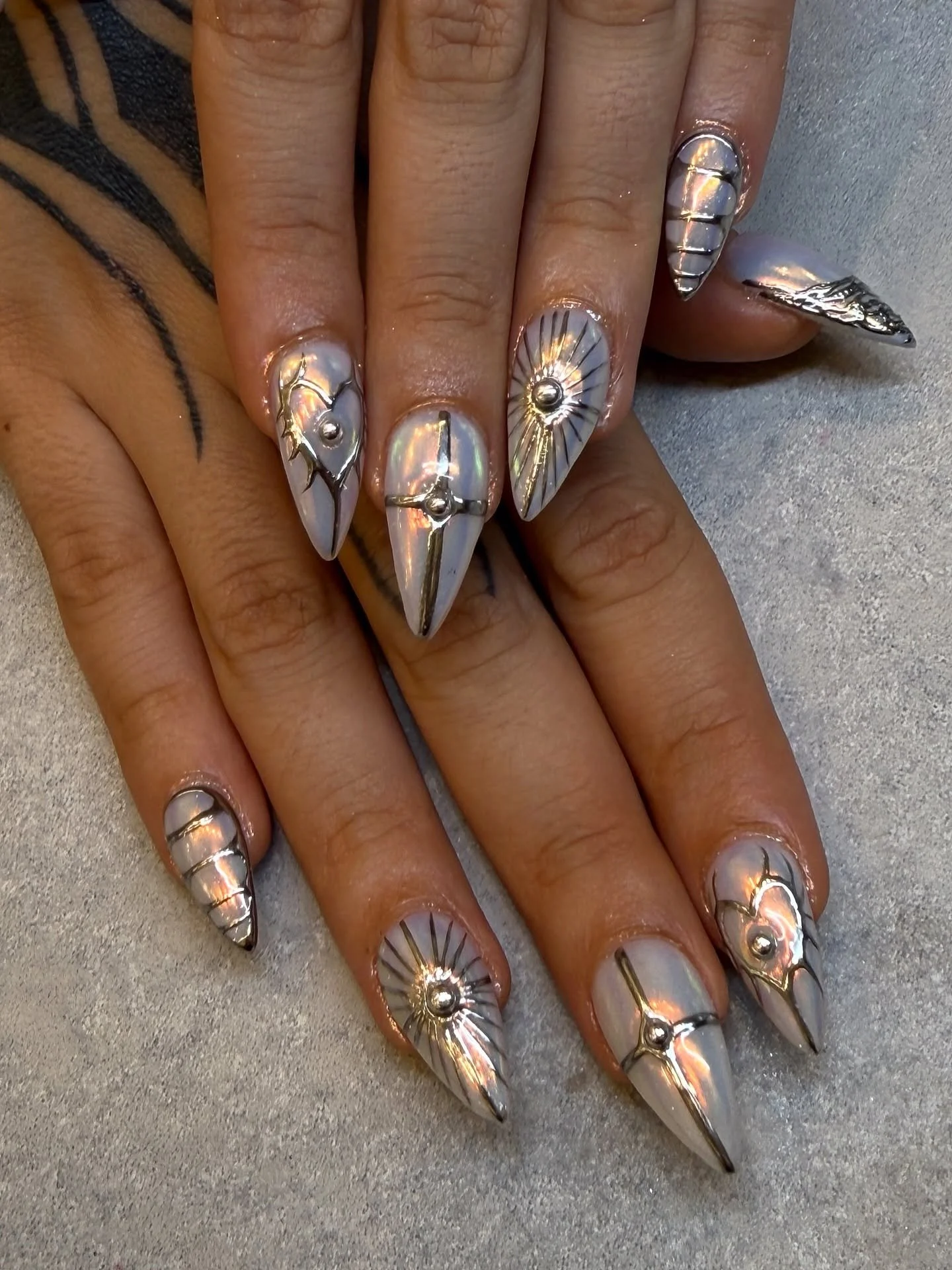 These nails are screaming main character energy!

Nails by Master Artist, Emily. 🩶

Chrome nails. Stiletto nails. Silver chrome nails. 3D nail art. Silver nails. Heart nails. Milky white nails. Gel nail art. 

#chromenails #stilettonails #milkywhite