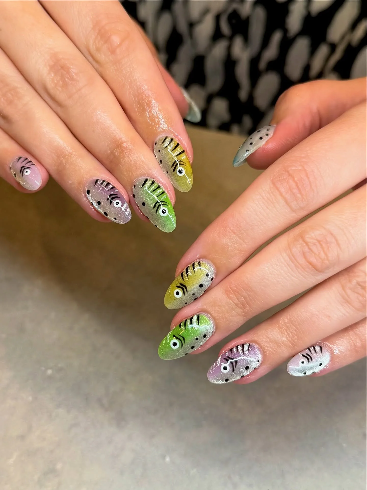 Just keep swimming. Just keep swimming, swimming, swimming! 🐟🐠

Pretty, shimmery fish nails with cat eye effect. 

Nails by Master Artist, Amy. ✨

Cat eye nails. Fish nails. Shimmery nails. Gel nail art. Gel nail design. Gel nail polish. Shellac na