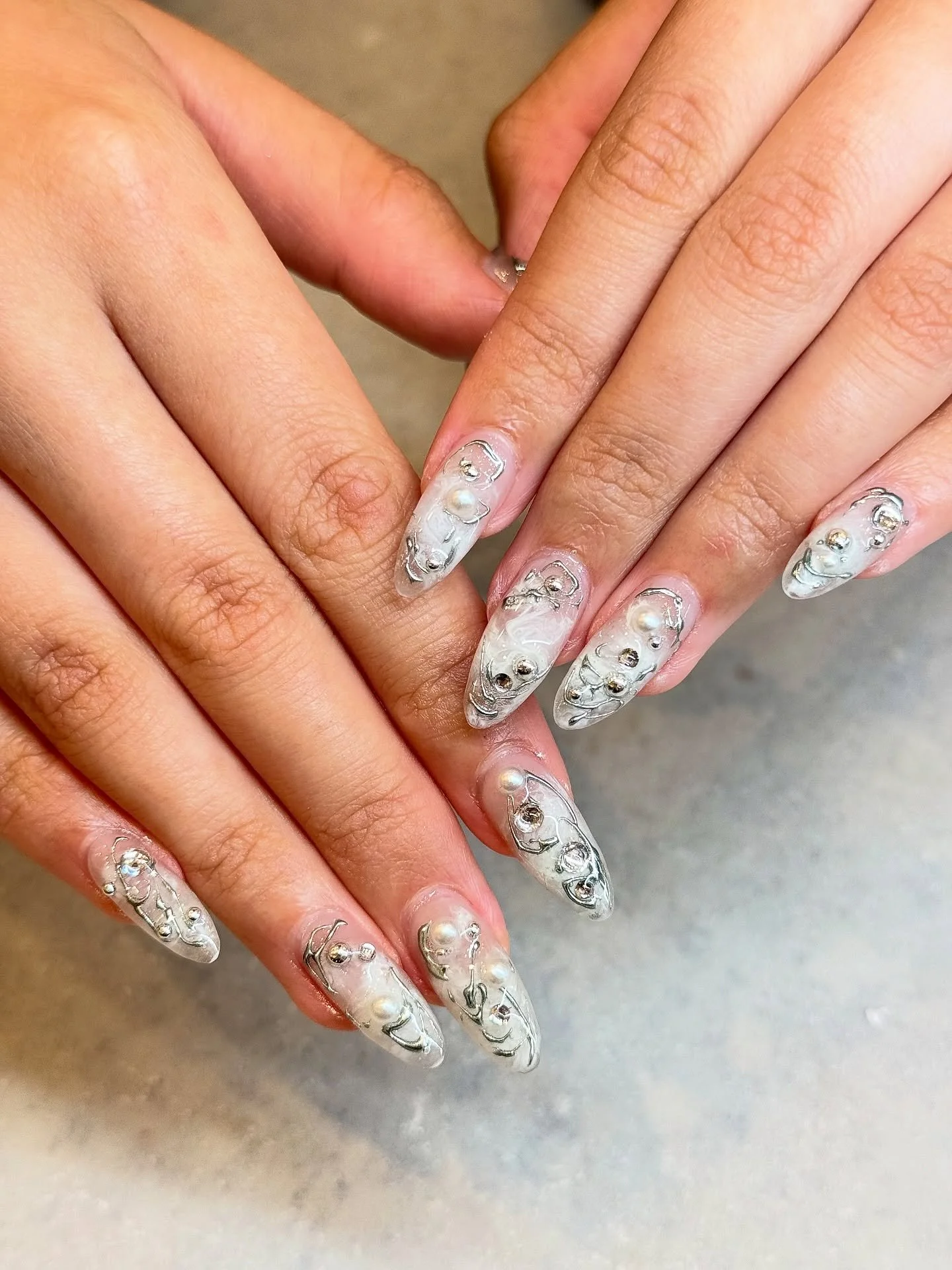 Is there ever a time that our master artist&rsquo;s work doesn&rsquo;t eat?! 😍 SHEESH!

Nails by Master Artist, Mia. 🤍

Swirl nails. Marble nails. White nails. Chrome nails. Gel X. Acrylic nails. BIAB. Gel manicure. Nail extensions. Almond nails. G