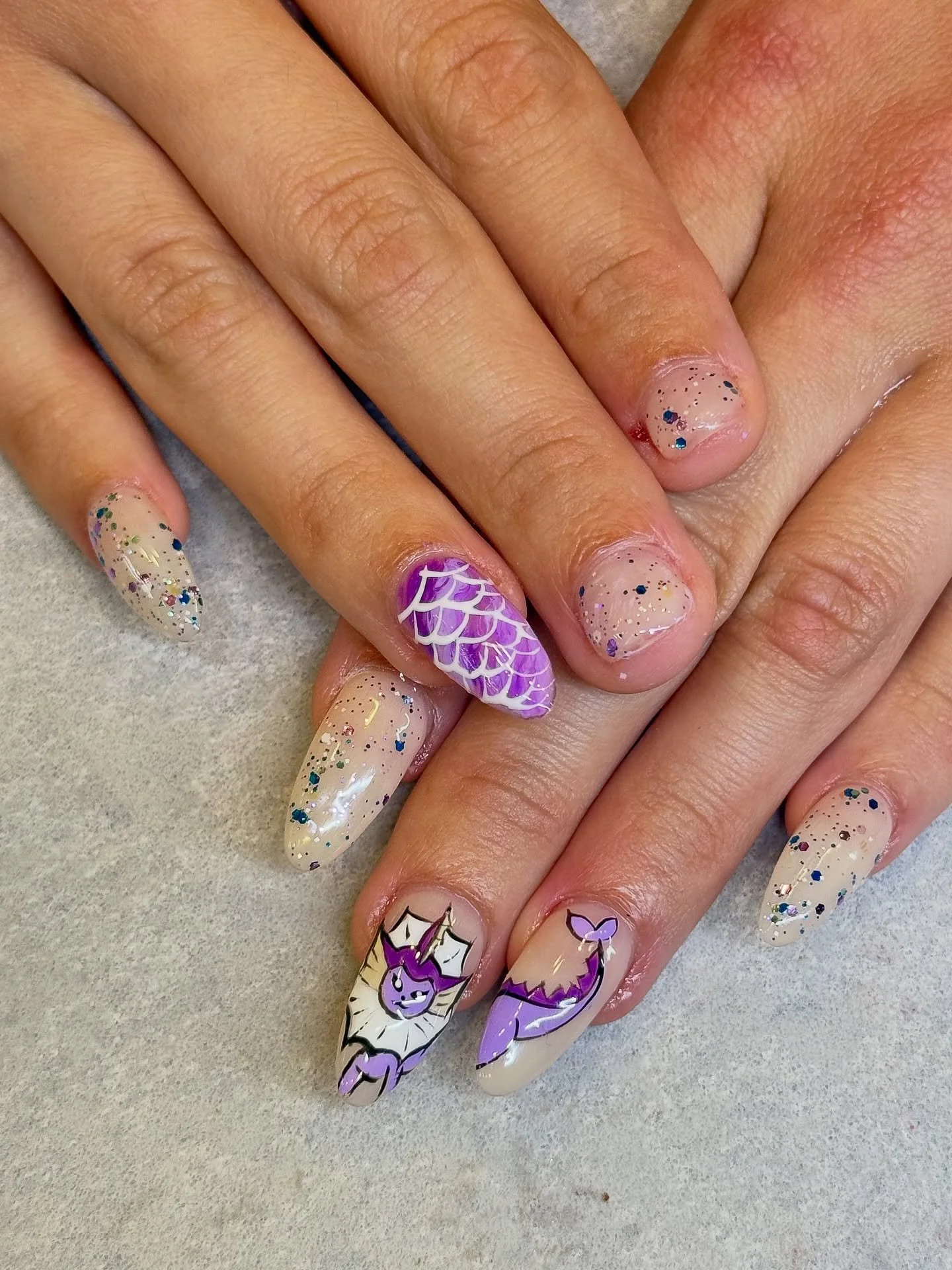Such a cute set of nails! We love all things that glitter and shimmer. 💜✨

Nails by Master Artist, Mia. 💟

BIAB. Builder gel. Gel X. Acrylic nails. Nail extensions. Dragon nails. Purple nails. Glitter nails. Shimmery nails. Almond shaped nails. Gel