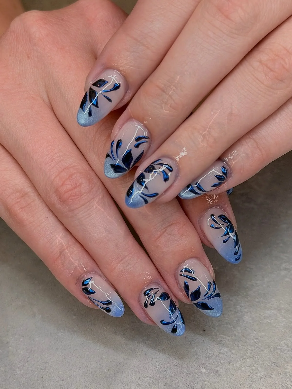 Beautiful blue hues. 🦋

Nails by Senior Artist, Sarah. 💙

Cat eye nails. French tip nails. Blue nails. Ombre nails. Chrome nails. Gel nail art. BIAB. Builder gel. Acrylic nails. Almond nails. Nail extensions. Nail trends. Trending nails. 

#bluenai