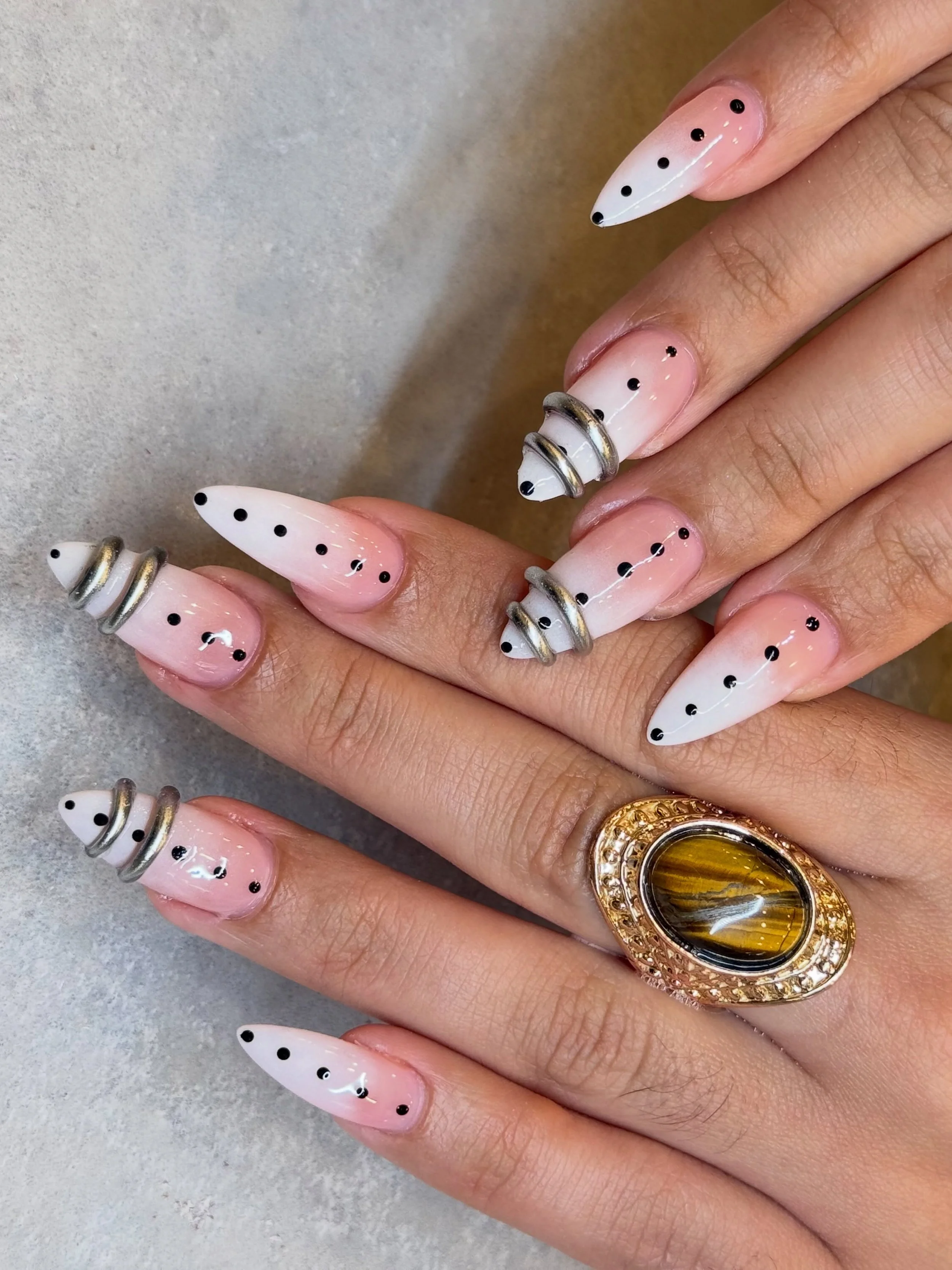 Ombre nails with dots and bangles. Looking bougie and bad ass. 🔥

Nails by Master Artist, Mia. 🖤

#ombrenails #banglenails #polkadotnails #almondnails #3dnailart ombr&eacute; nails, bangle nails, chrome nails, polkadot nails, gel nail art, 3d nail 