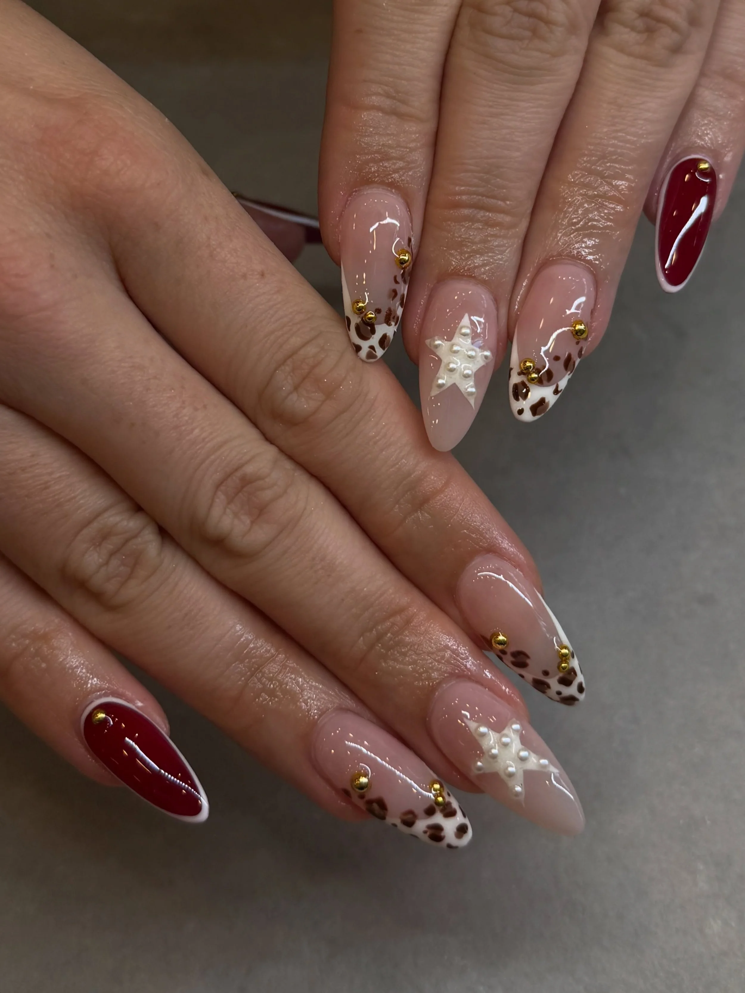 Red with animal print is such a hot combo! 🔥

We can craft your nails with acrylic, builder gel or gel x.

Nails by Master Artist, Amy. 🐆❤️

#leopardnails #rednails #frenchtipnails #starnails #goldnails Sydney nail salon, almond nails, red nails, n