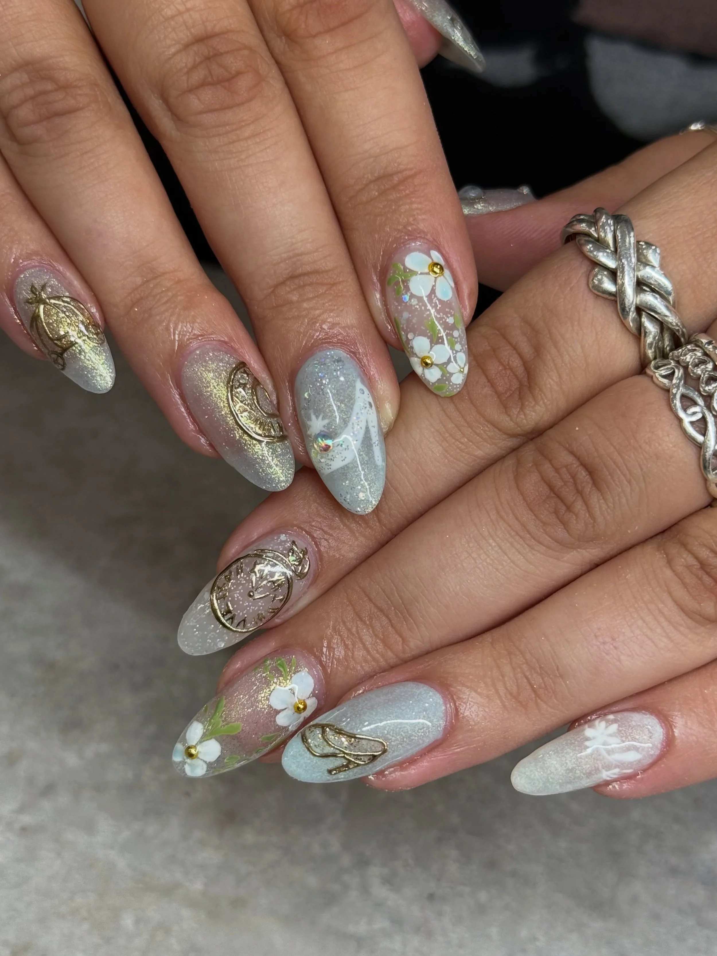 &ldquo;Have courage and be kind. Where there is kindness, there is goodness, and where there is goodness, there is magic.&rdquo; ✨

Nails by Master Artist, Mia. 🩵

#cinderella #disneynails #cinderellanails #glitternails #chromenails Cinderella, Disn