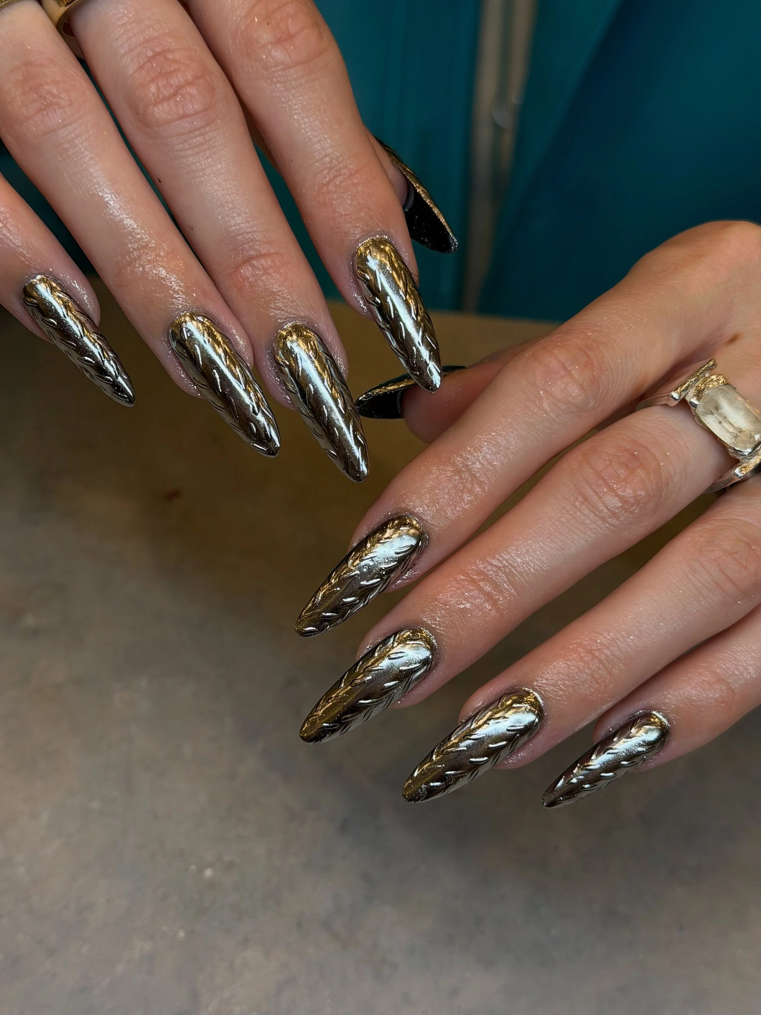 Cool, metallic vibes. 🩶

Nails by Senior Artist, Tracy. 🪐

#metallicnails #chromenails #3dnails #silvernails #gelx acrylic nails, gel x nails, 3d nails, 3d gel nails, chrome nails, silver nails, metallic nails, nail extensions, almond nails, builde