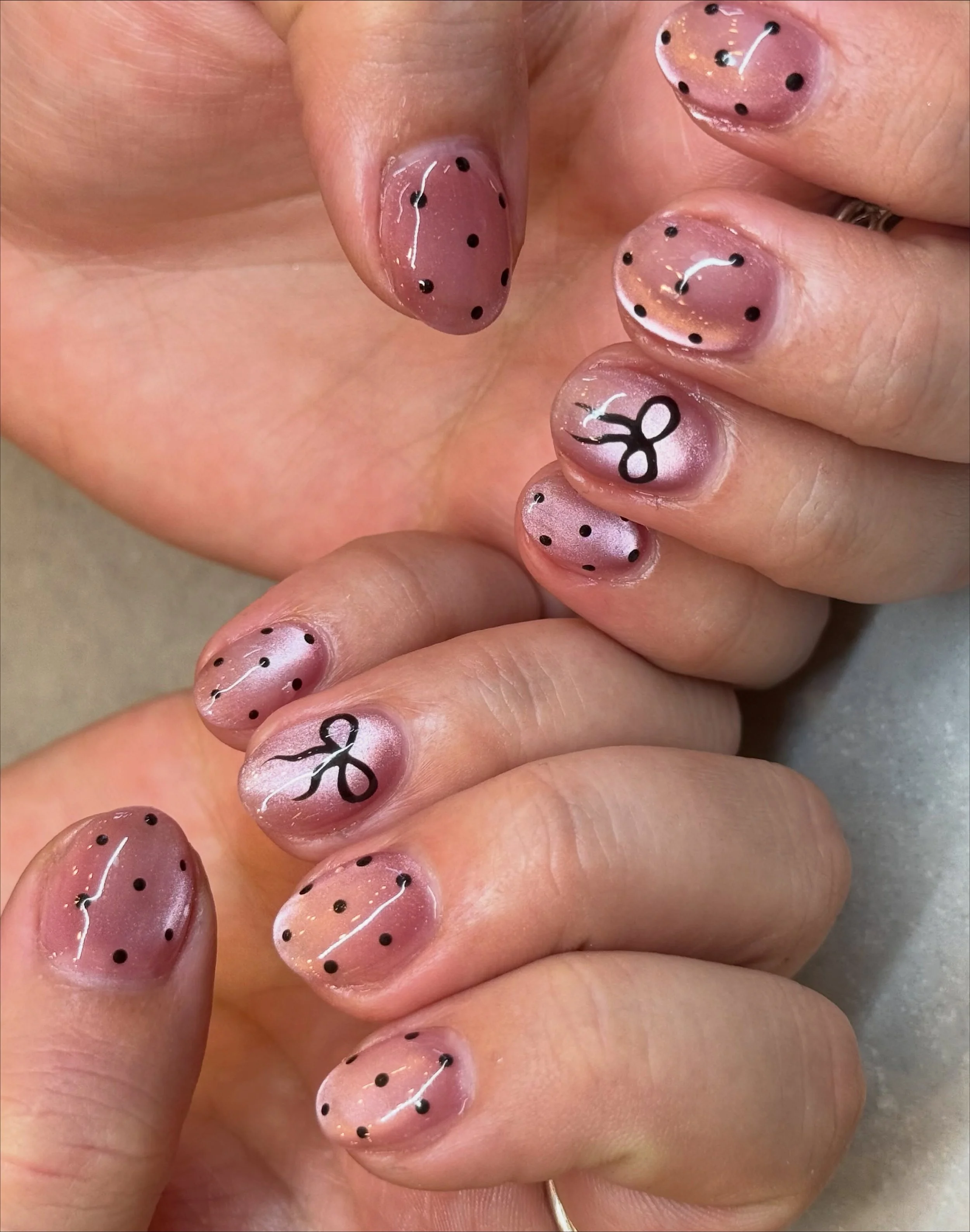 Beautiful biab manicure with basic + cat eye design. 

Nails by Master Artist, Mia. 💞

#biab #cateyenails #pinknails #polkadotnails #bownails cat eye nails, polka dot nails, pink nails, builder gel, short nails, gel manicure, gel nail polish, sydney