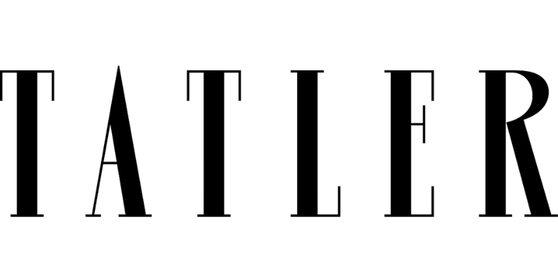 Close-up view of the word 'Tatler' written in black capital letters with a modern serif font.
