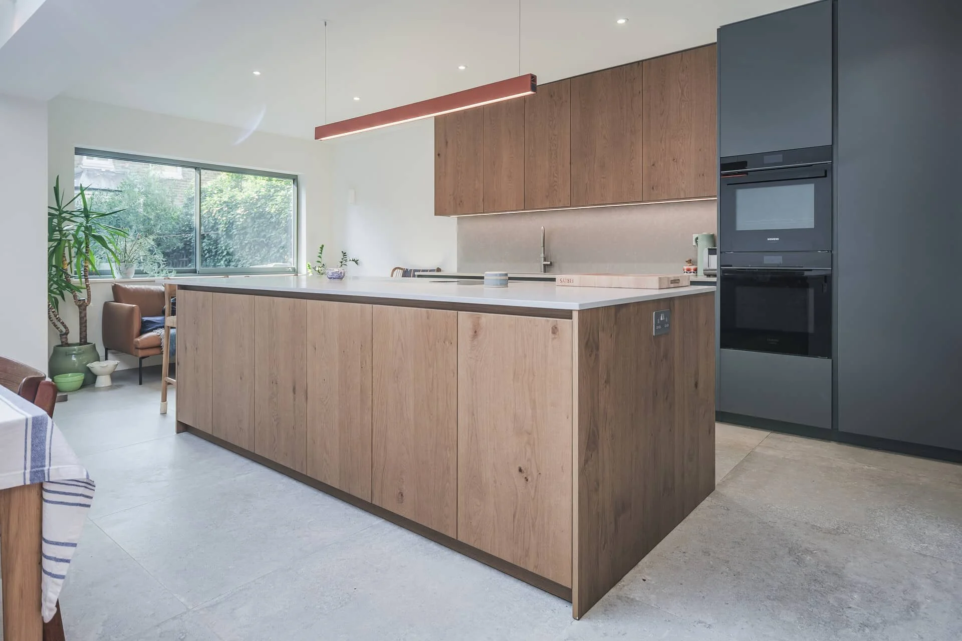 Oak and Green Handleless Kitchen in Brockley