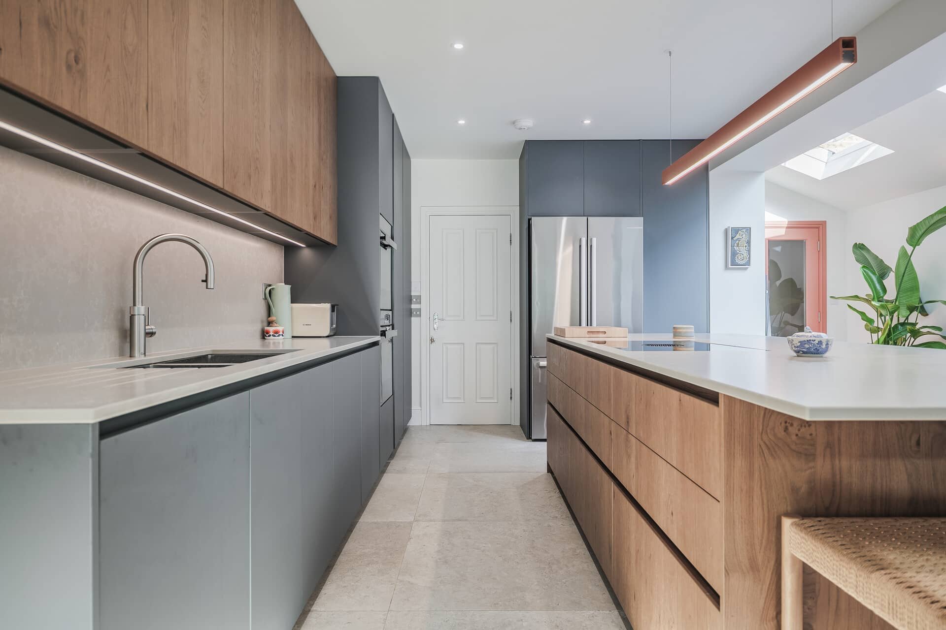 Oak and Green Handleless Kitchen in Brockley