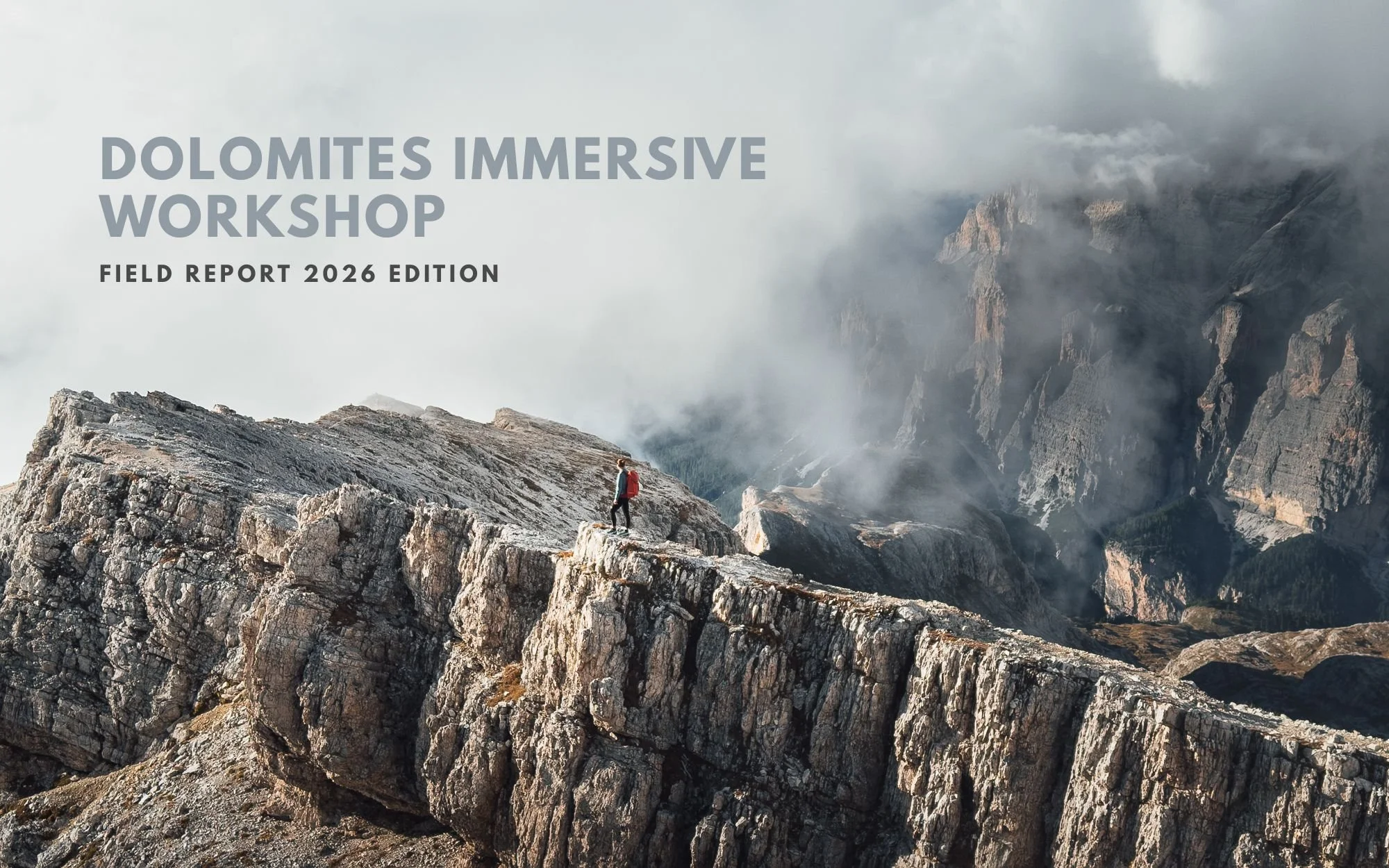 Dolomite peaks emerging through clouds, with the title Dolomites Immersive Workshop: Field Report 2026 Edition.