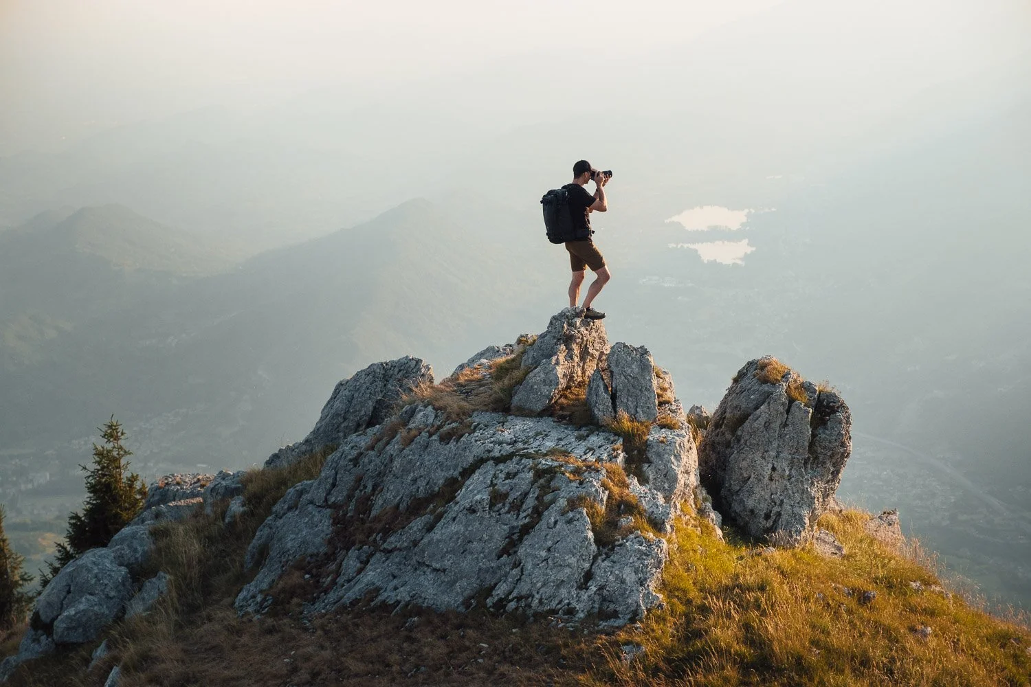 Andrea Livieri carrying the NYA-EVO FJORD 60-C camera backpack outdoors.