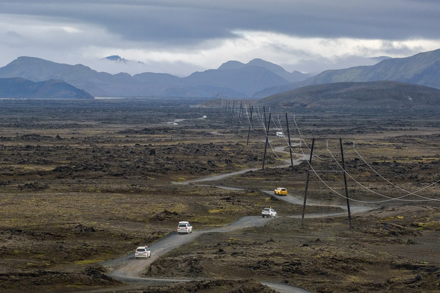 Cars driving along the F208 towards Landmannalaugar in the Iceland Highlands photographed handheld with the Sigma 100-400mm F5-6.3 DG DN OS | Contemporary on the Fujifilm X-T4.