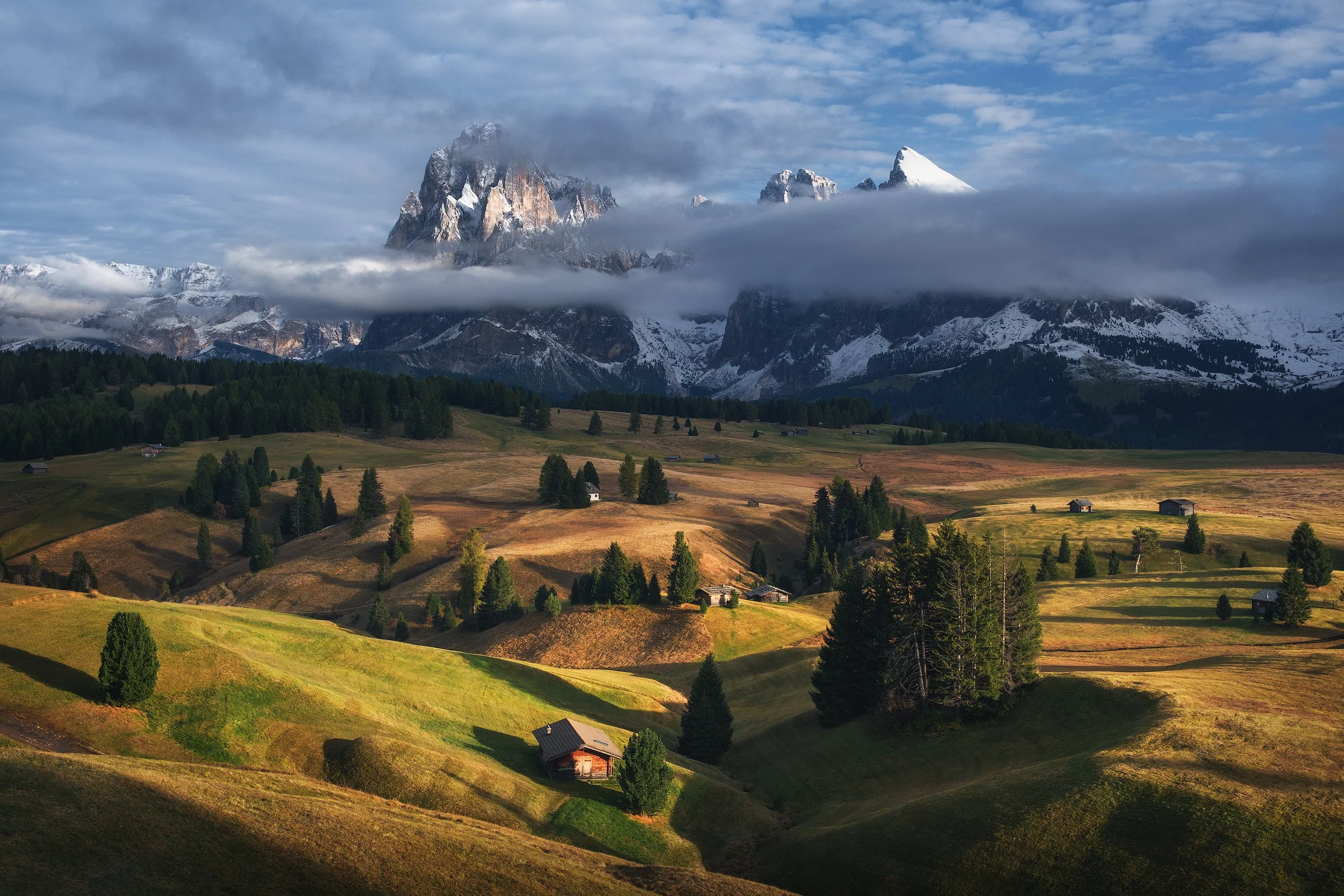 the alpe di siusi meadow during the sunset in autumn with beautiful foliage colors and captured with the fujifilm x-t50 and fujinon 16-50mm lens