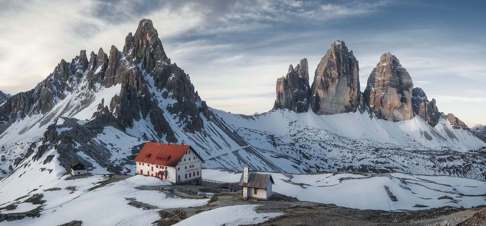 dolomites tre cime di lavaredo panoramic view with the rifugio locatelli during the sunrise in spring