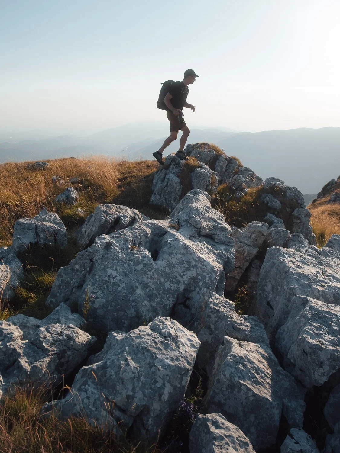 Andrea Livieri carrying the NYA-EVO FJORD 60-C camera backpack outdoors