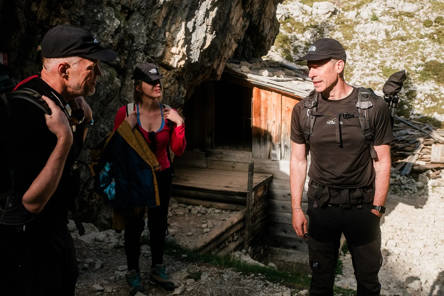 Workshop participants exploring a stone shelter at the First World War open-air museum at Cinque Torri.