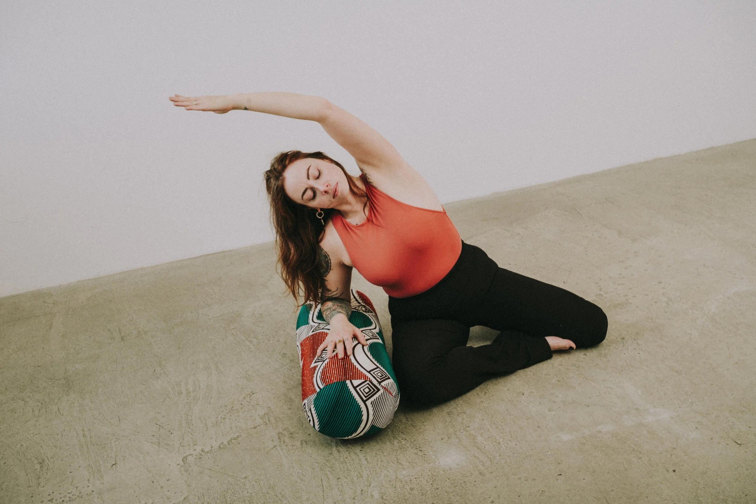 silvia yoga practitioner stretching in a studio