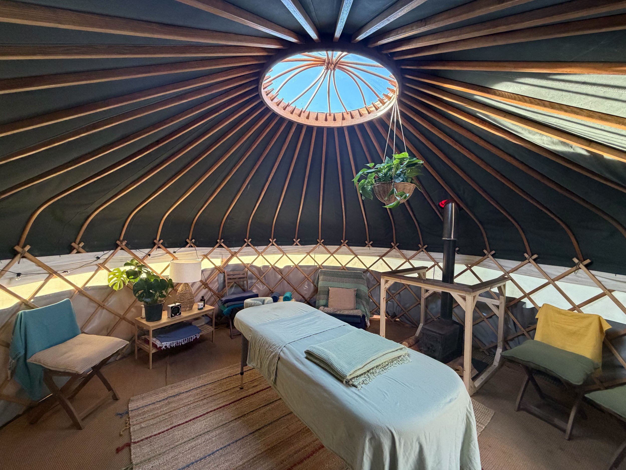 inside view with skylight of camberwell therapies yurt at community sauna baths London