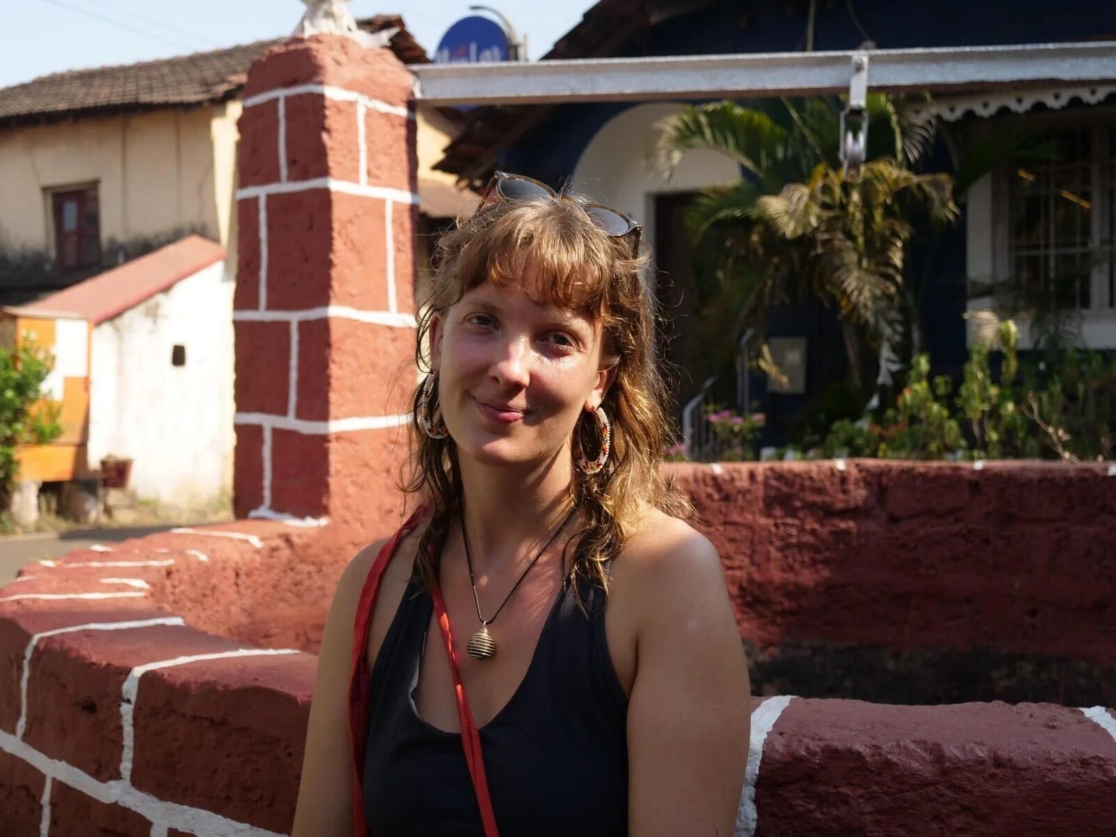 practitioner smiling and posing for the camera in the sunshine