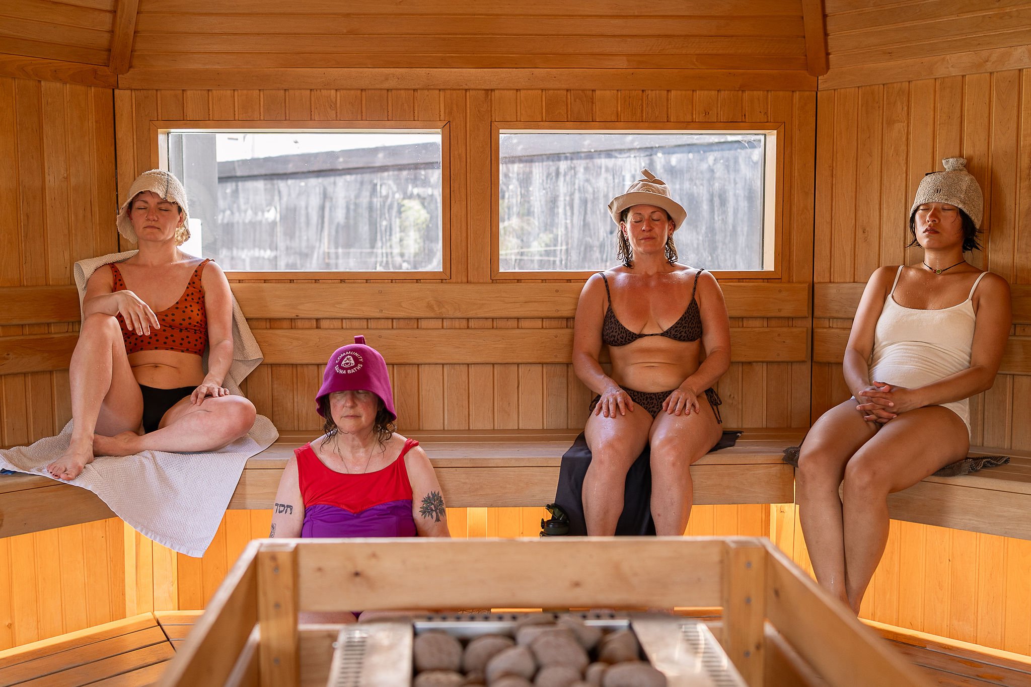 sauna bathers enjoying the peaceful sauna with eyes closed walthamstow community sauna baths london