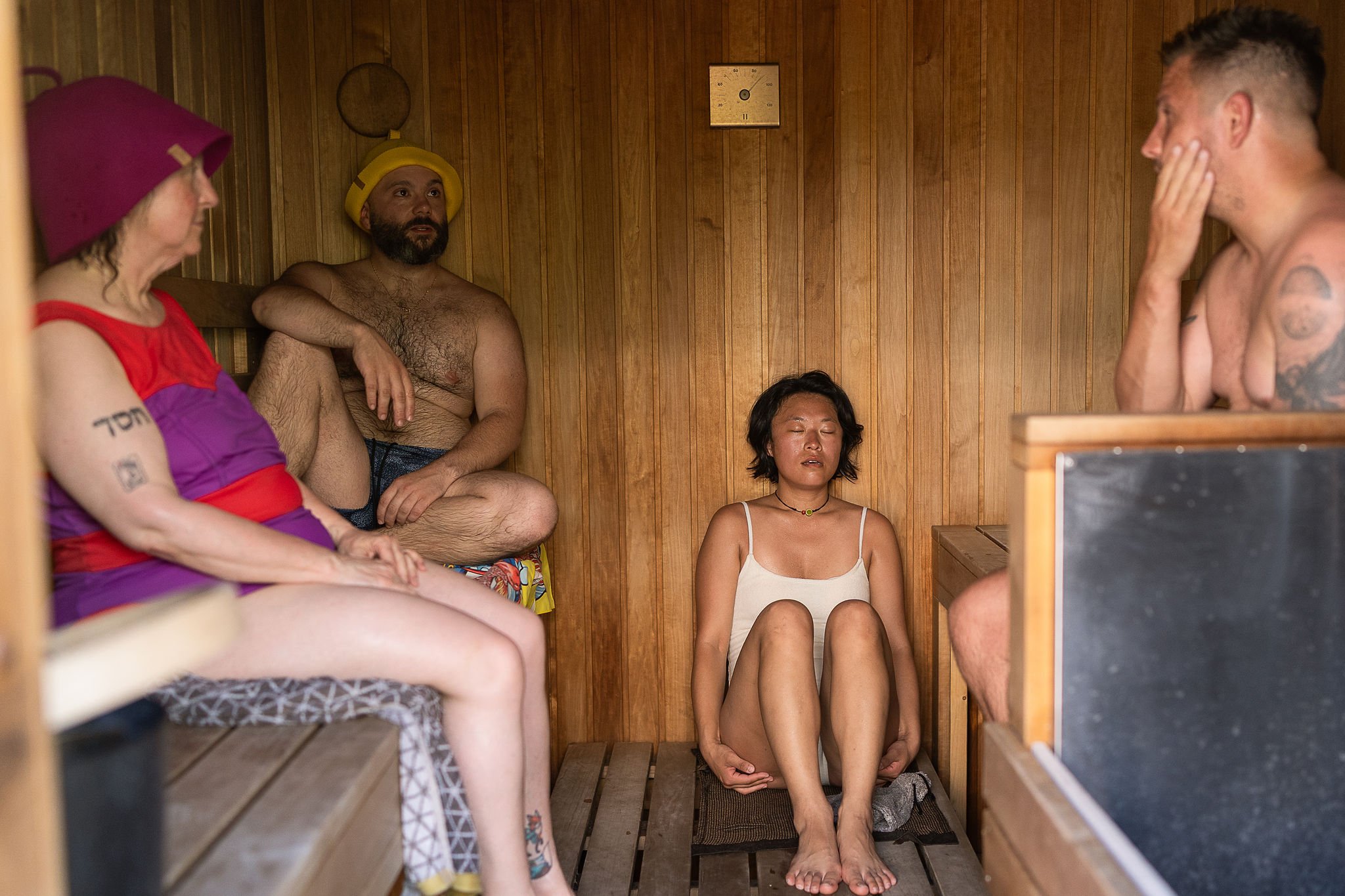inside a private hire sauna, bathers relax at walthamstow community sauna baths