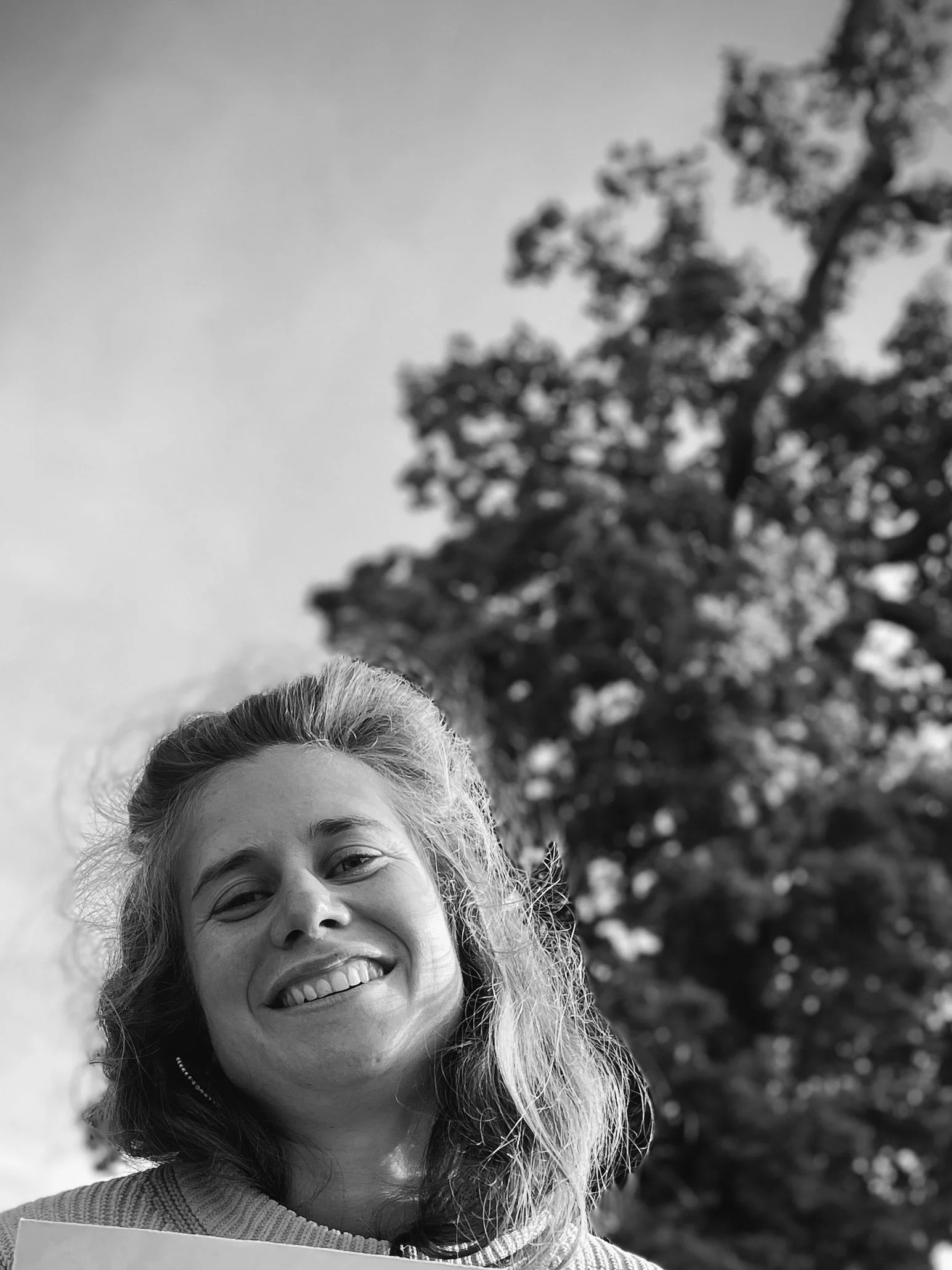 Tasmyn practitioner smiling outdoors