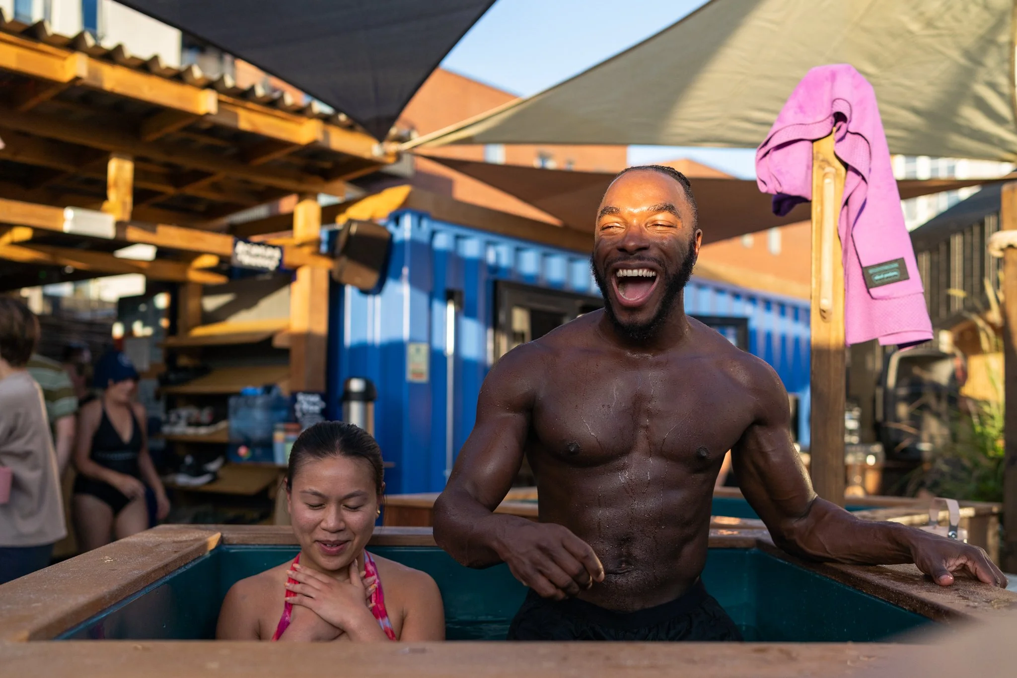 Community sauna goers enjoying the cold plunge at Walthamstow Community Sauna Baths