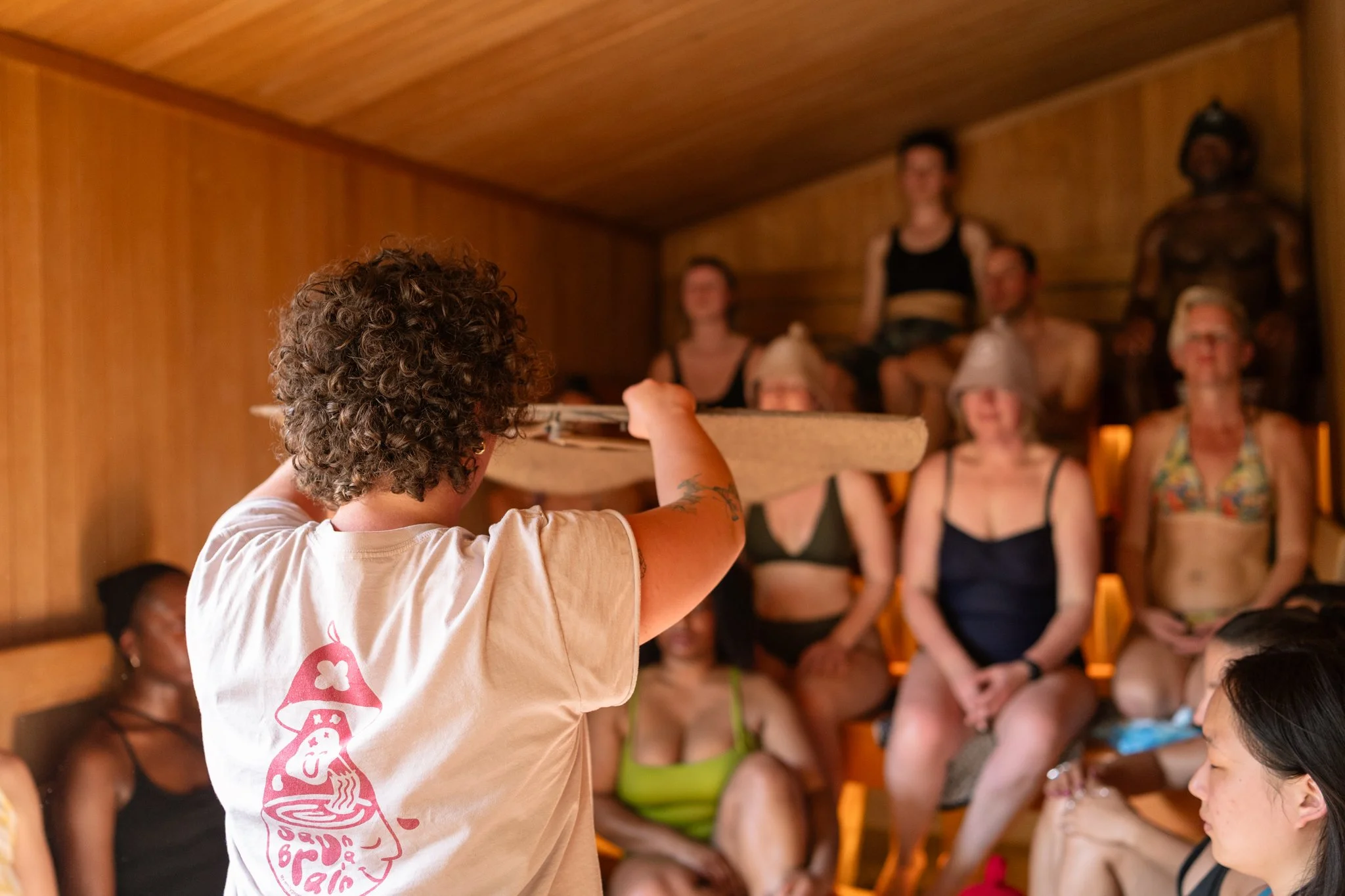 staff faning sauna goes at Camberwell Community Sauna Baths London