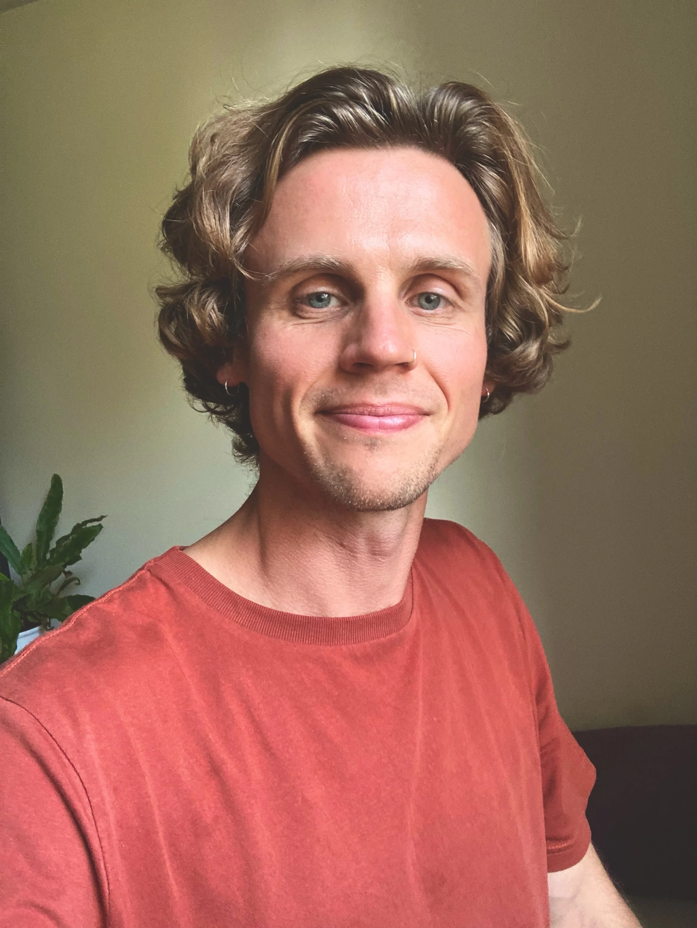 reiki master Joshua smiling for the camera