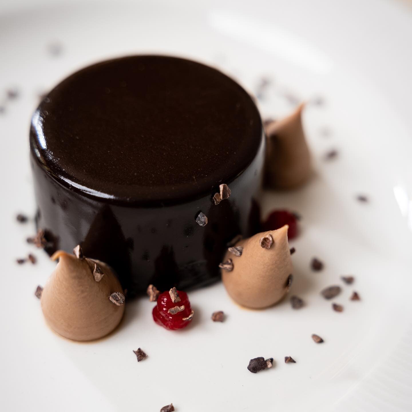 There&rsquo;s always room for dessert especially when dessert looks as good as this 👌🏼 Our Chocolate Delice is served with almond and raspberries and has a light, silky and delicate texture whilst remaining deliciously indulgent.
.
.
.
.
#TerraMode