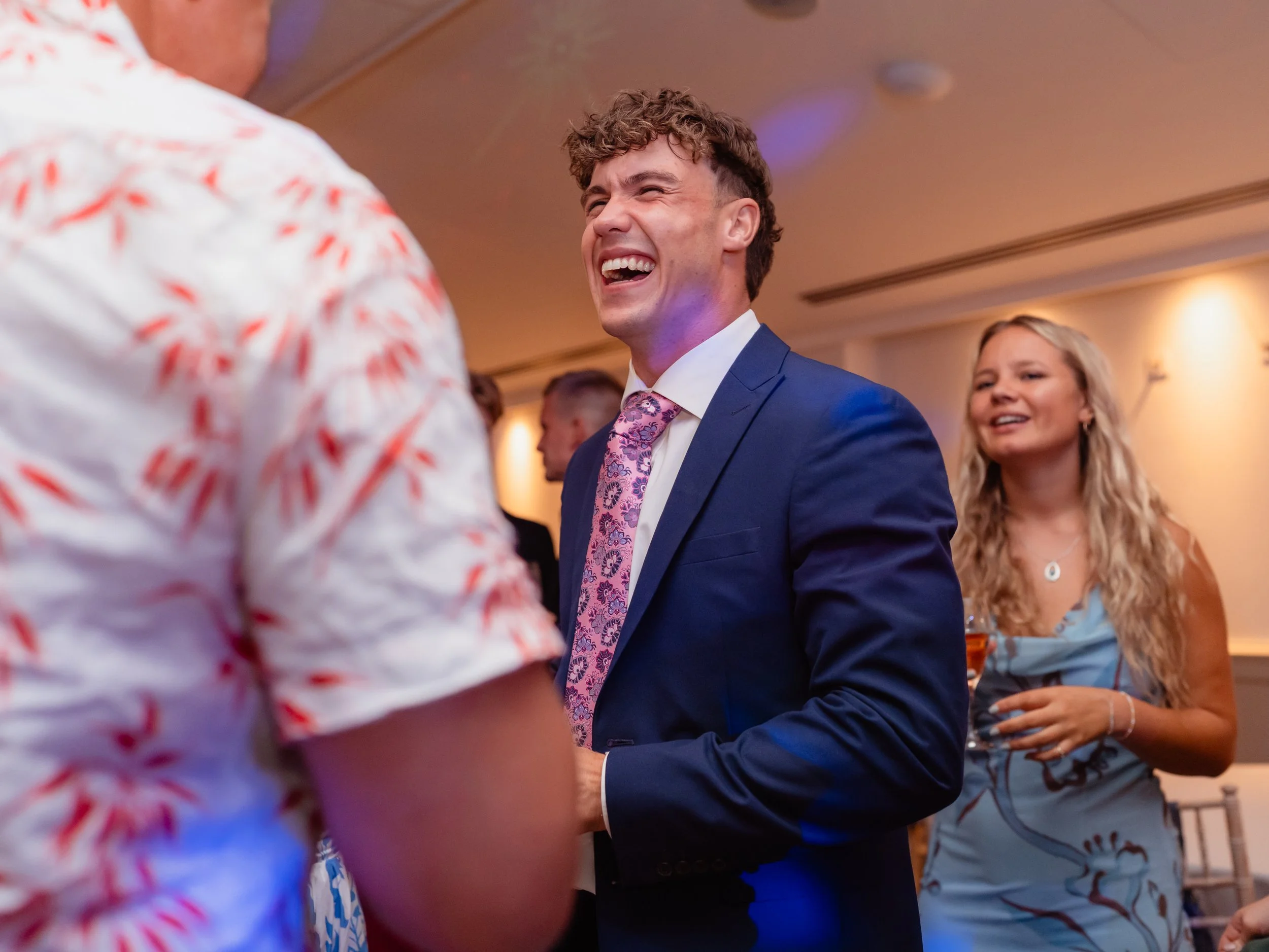 candid wedding dancing