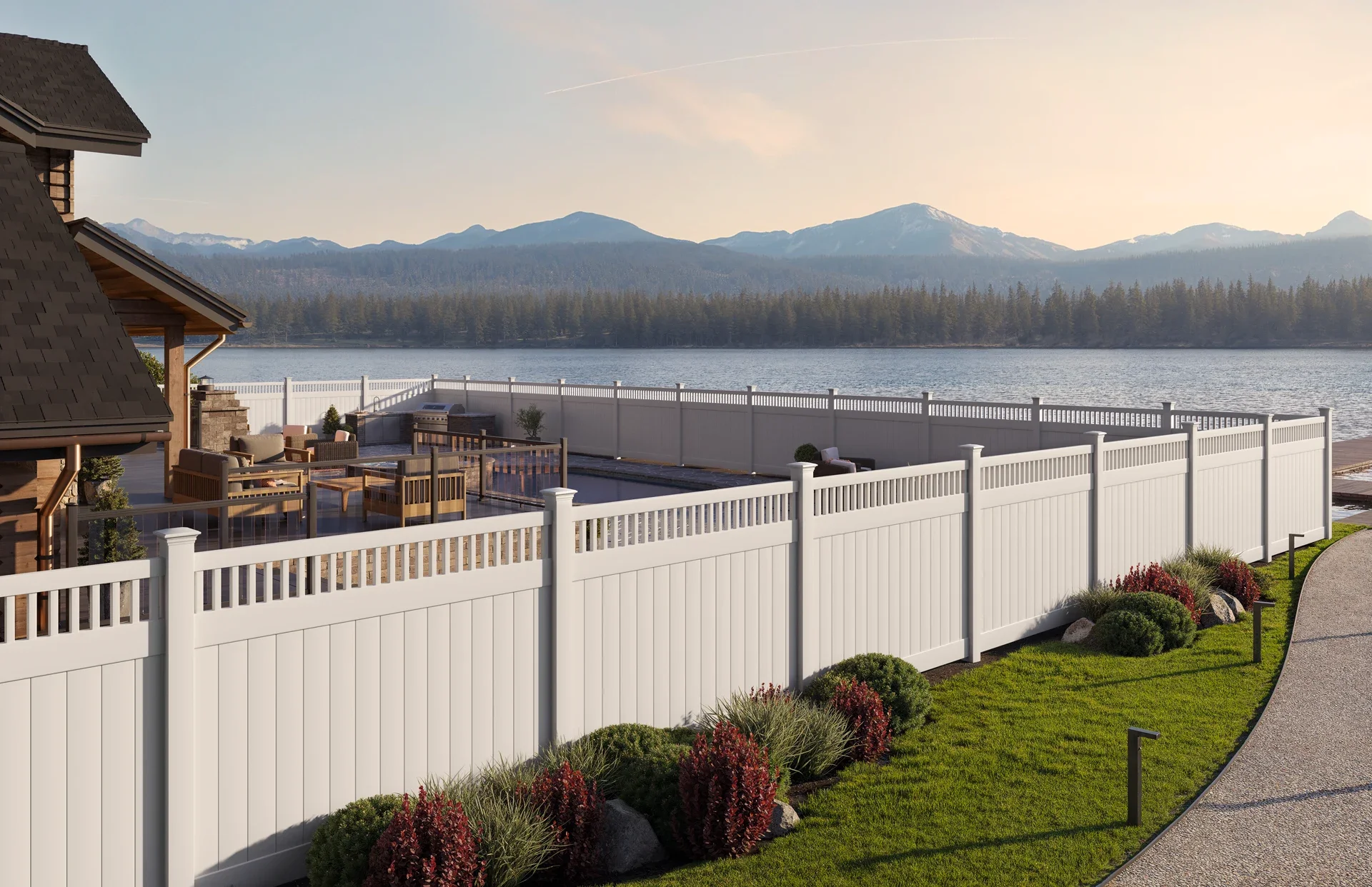 A wooden privacy fence in a backyard with trees and plants around it.