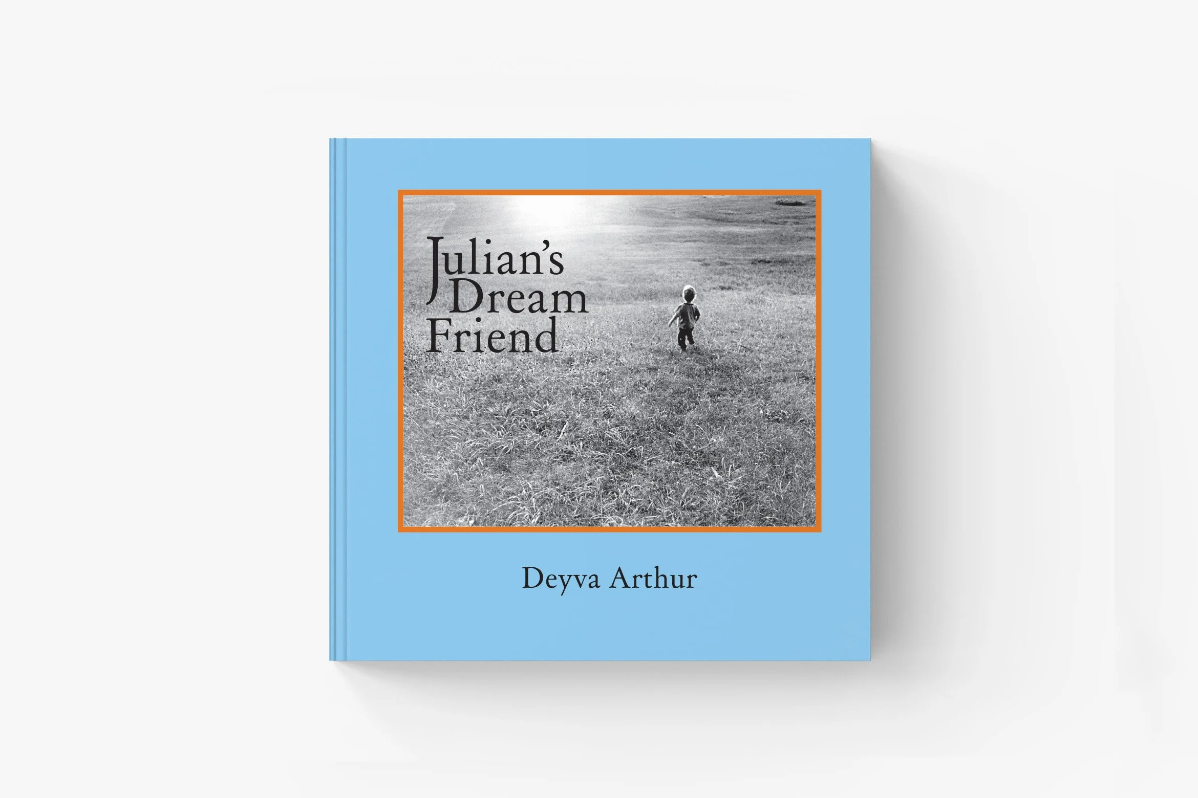 Blue Book  titled, Julians Dream Friend on a white backdrop