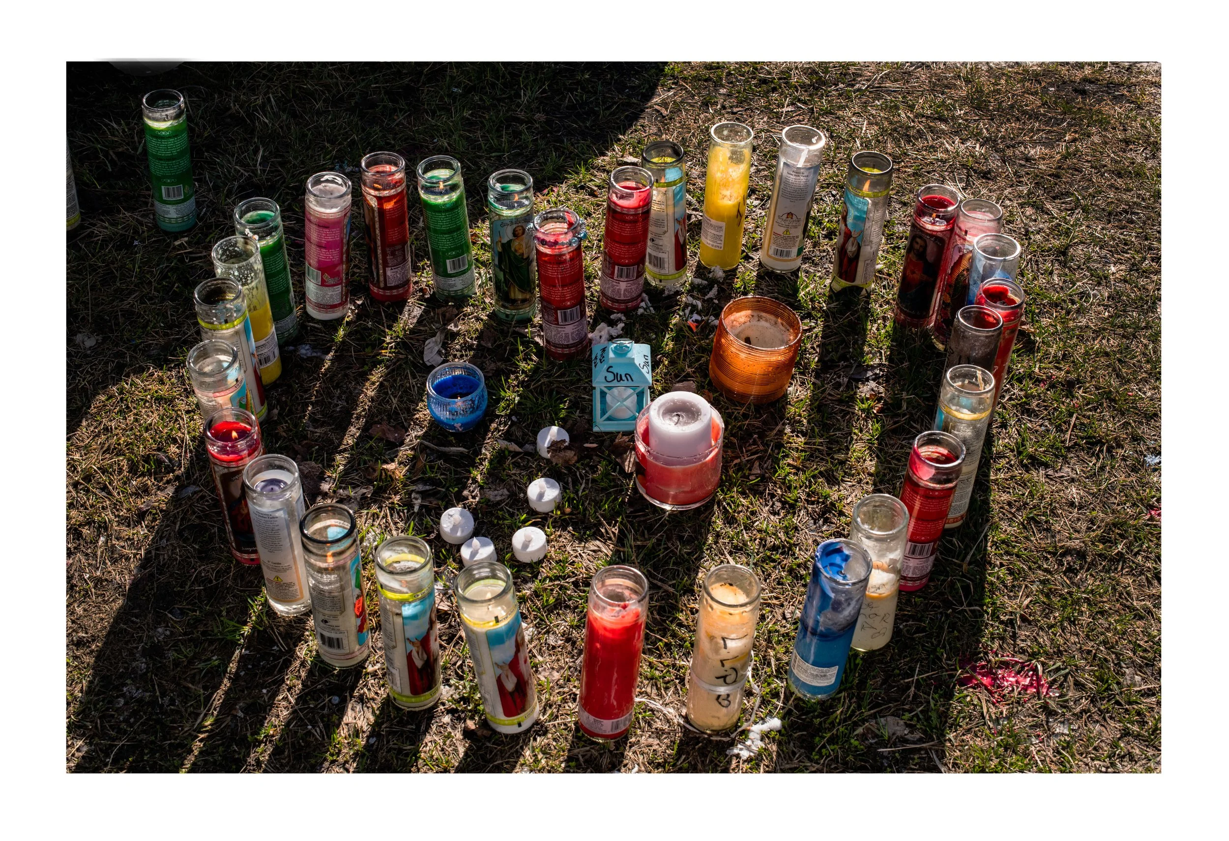 memorial of votives in the shape of a heart