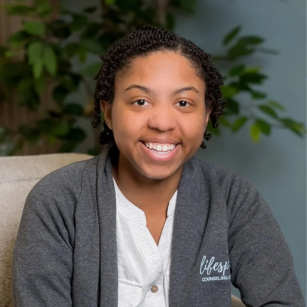 Headshot of Cam Davis, LGPC