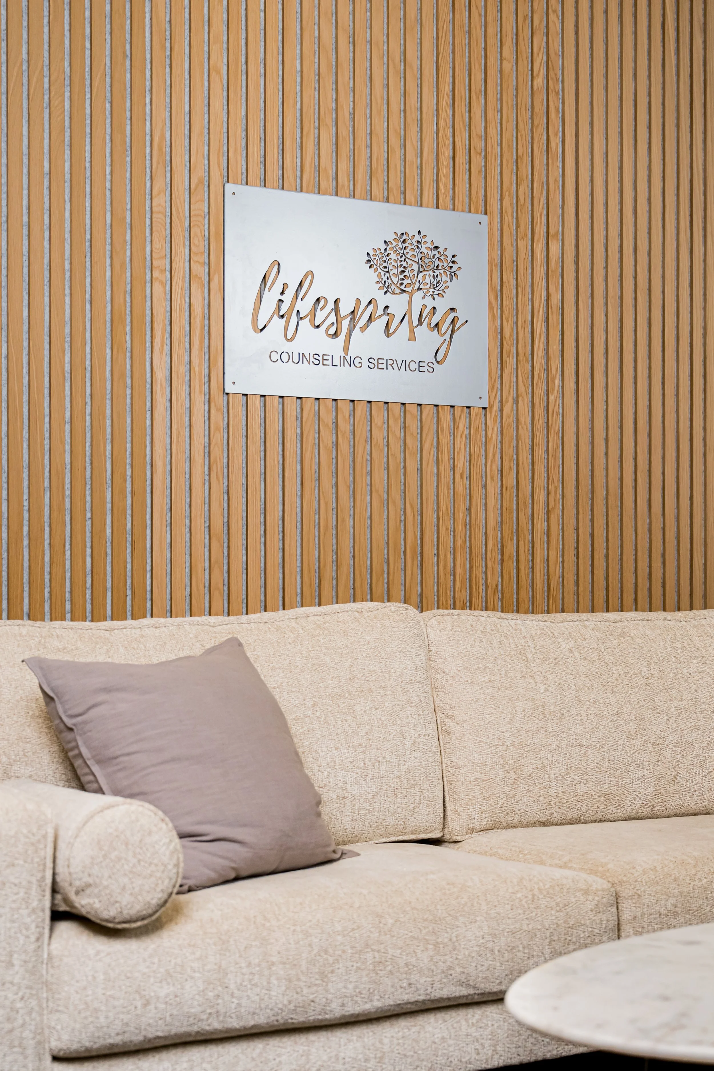 LifeSpring sign and couch