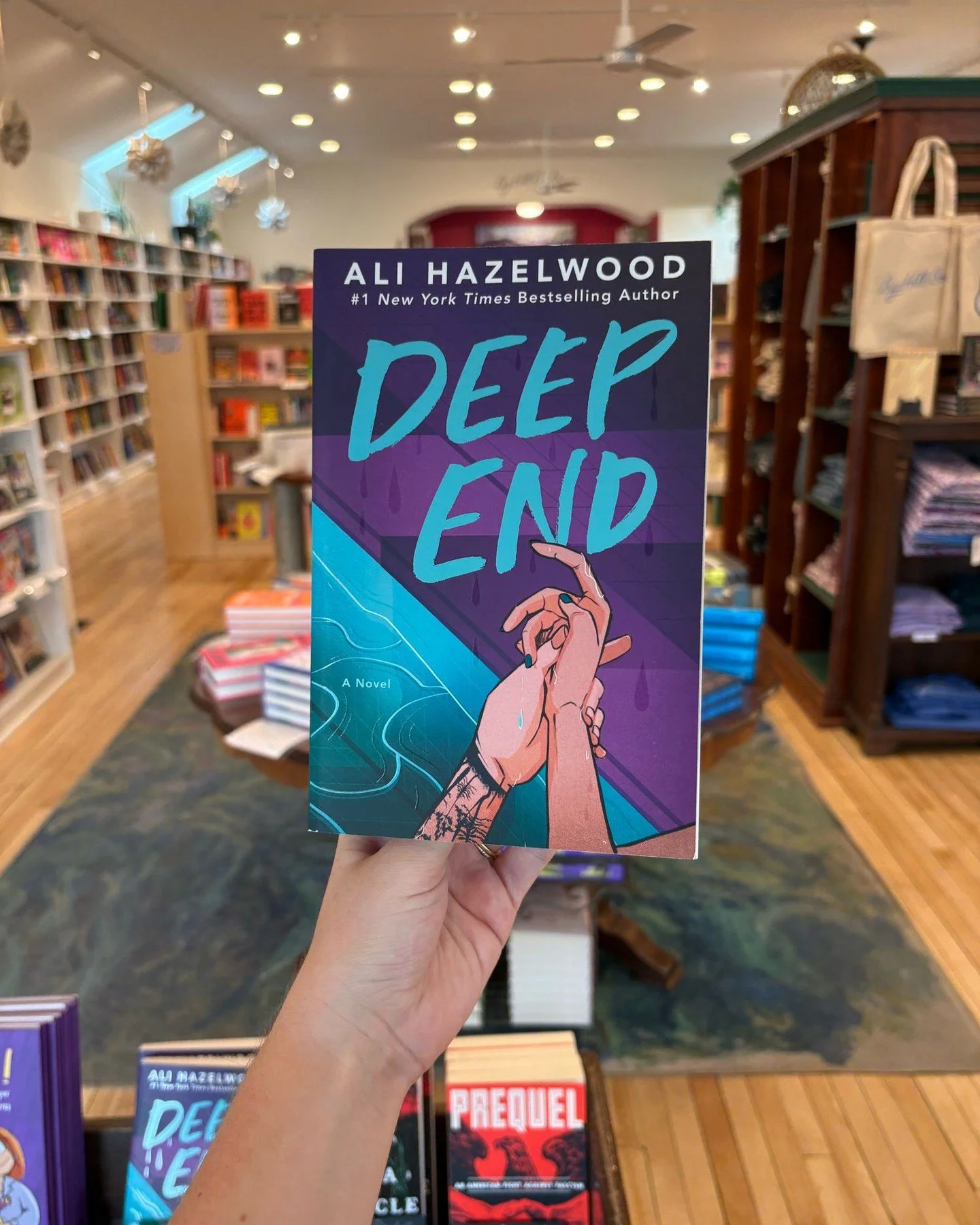 Romance book club meets tomorrow from 7 - 9 pm, where they&rsquo;ll be discussing Deep End by Ali Hazelwood - light snacks and drinks provided. Will we see you there? 👀💦

#AliHazelwood #DeepEnd #RomanceBookClub #SupportIndie #SupportLocal