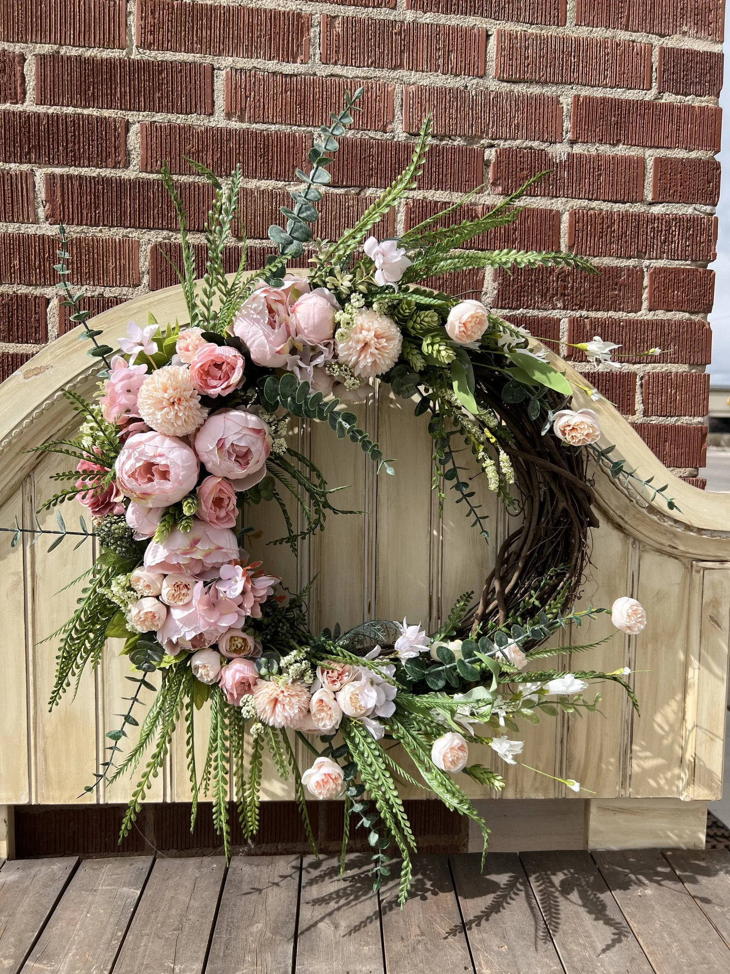 Sympathy half wreath — thistle + honey